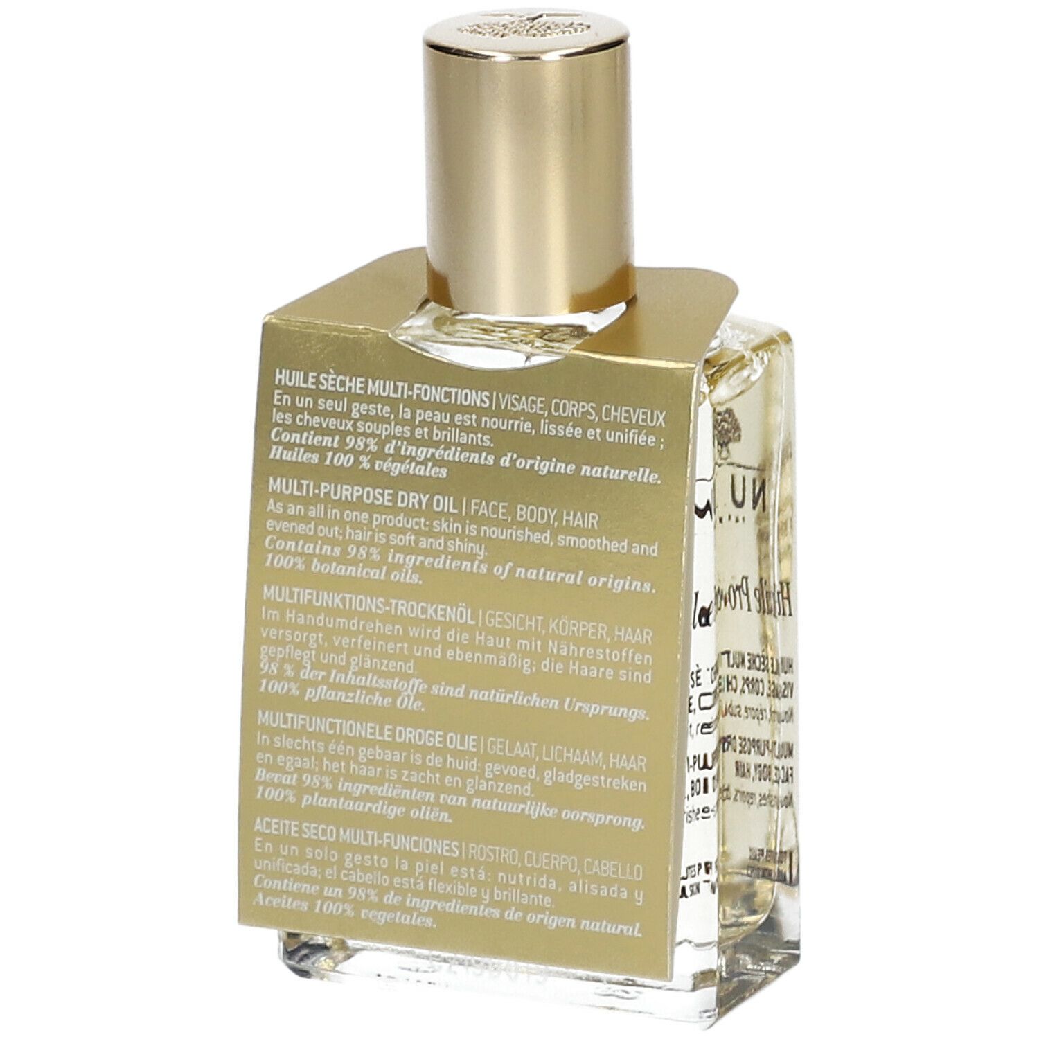 Vista posteriore del flacone d'olio con tappo dorato ed etichetta. Testo in più lingue.