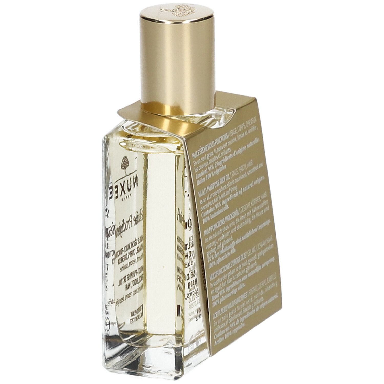 Flacone d'olio visto di lato. Tappo dorato ed etichetta con informazioni sul prodotto.