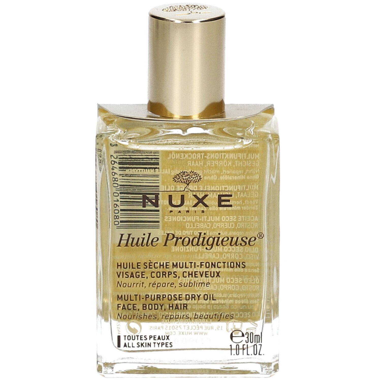 Flacone quadrato in vetro con tappo dorato. Etichetta con nome prodotto e testo.