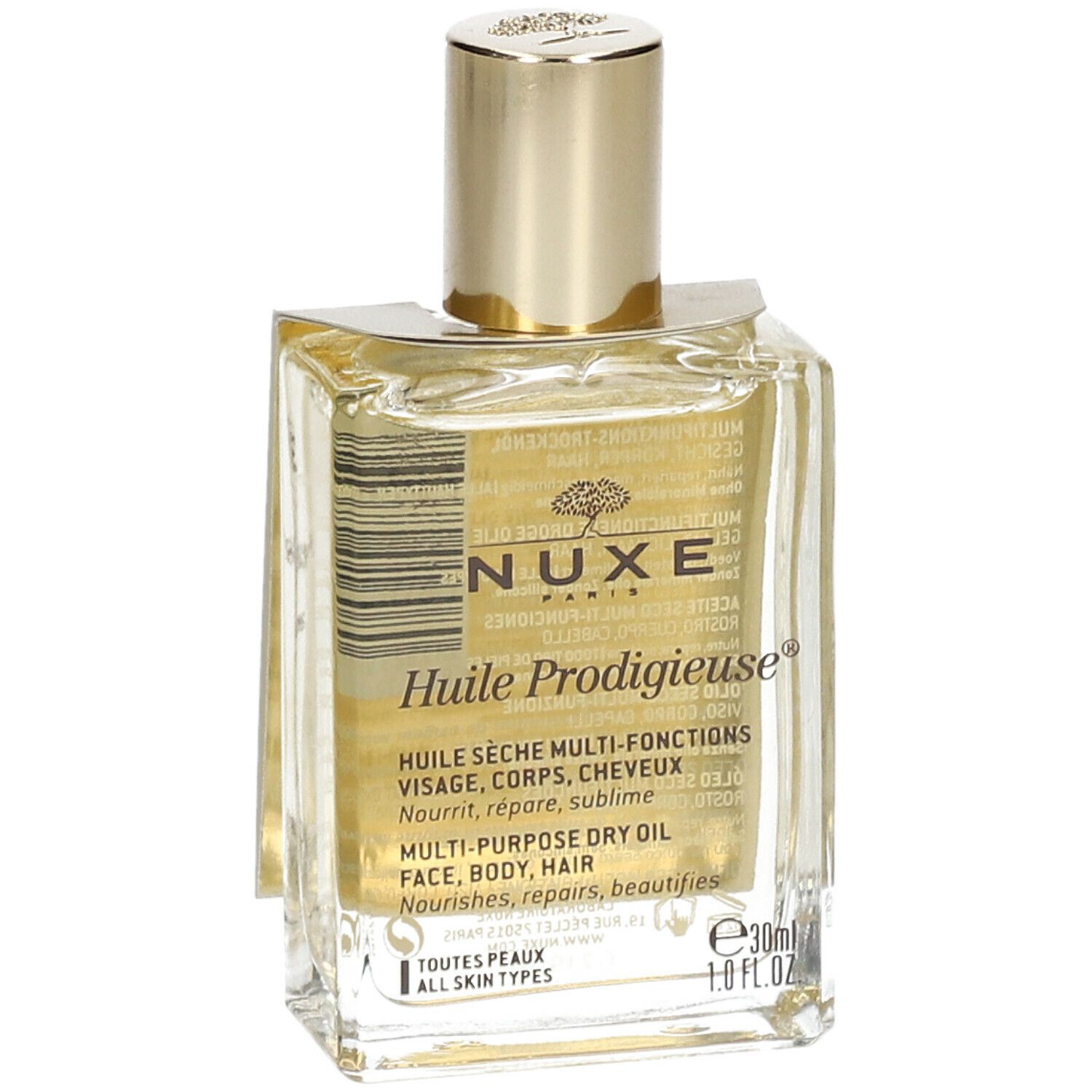 Flacone in vetro con tappo dorato. Etichetta con nome prodotto e testo.