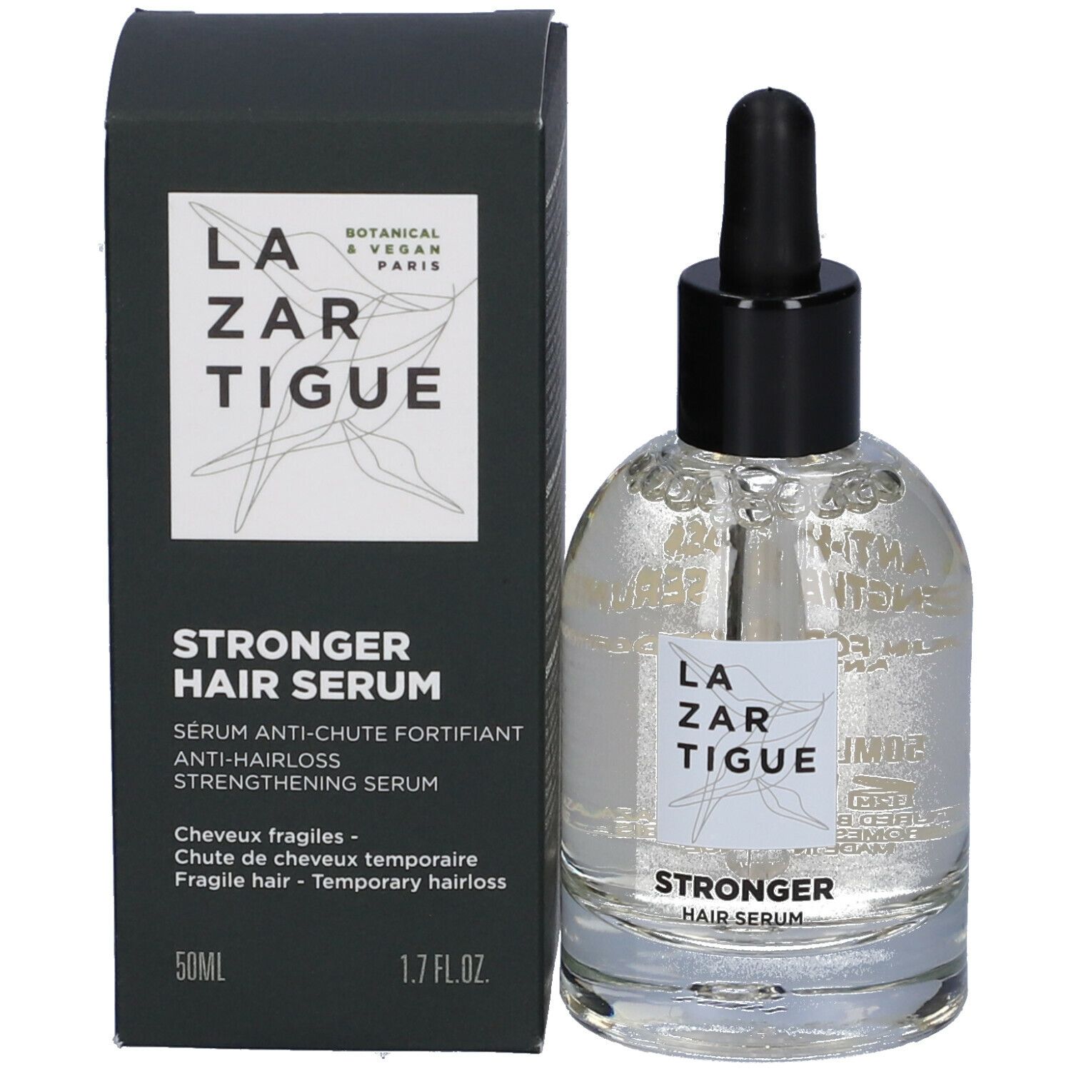 Flacone di siero in vetro, tappo nero e contagocce, accanto a una scatola nera. Sul flacone c'è scritto "LAZARTIGUE" e "STRONGER HAIR SERUM".