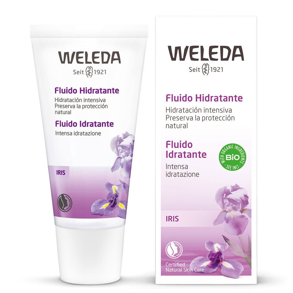 Tubo e confezione di fluido viso Weleda. Bianco, con accenti viola e fiori di iris. Testo: « Fludio Idratante » e sigillo « Bio ».