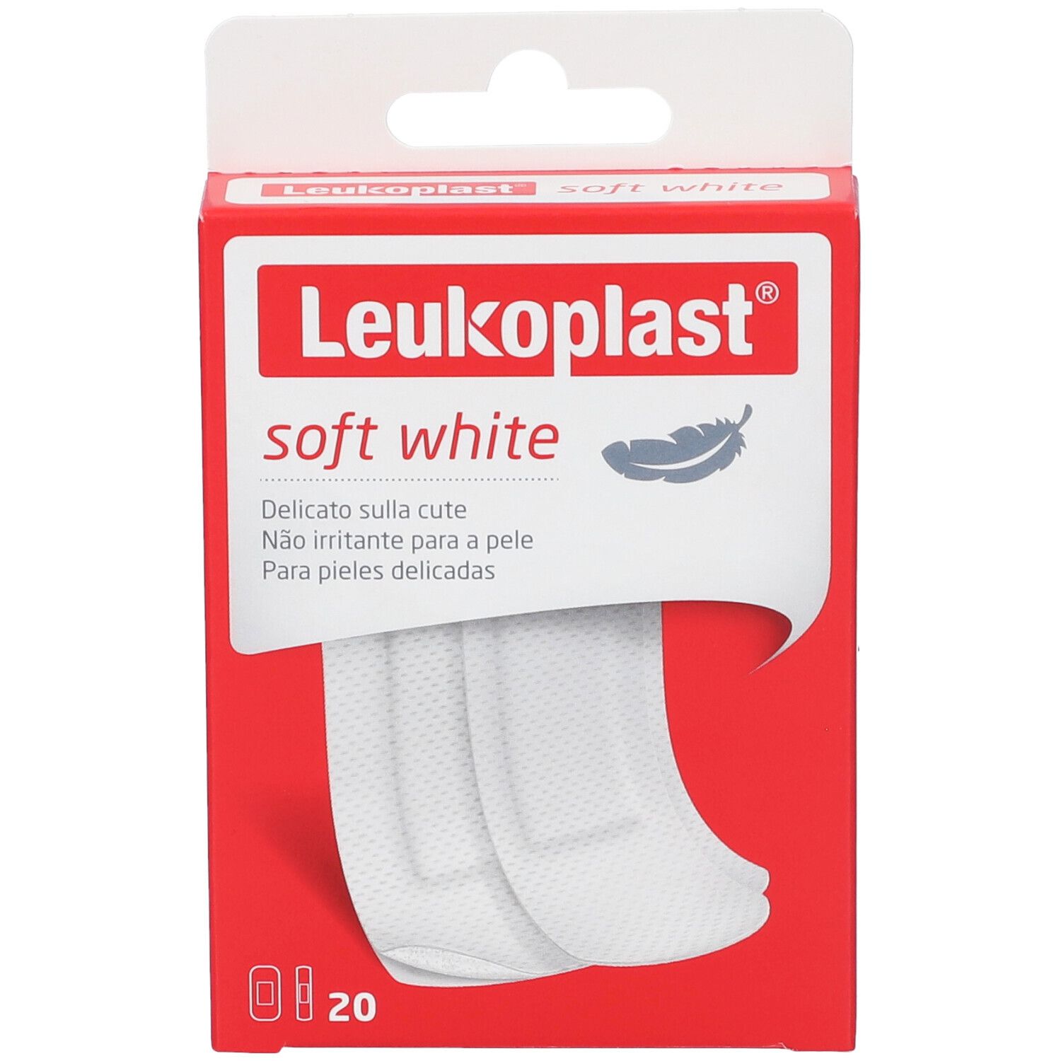 Confezione rossa con cerotti. Scritta: Leukoplast soft white. Contiene 20 cerotti. Due cerotti sono visibili.