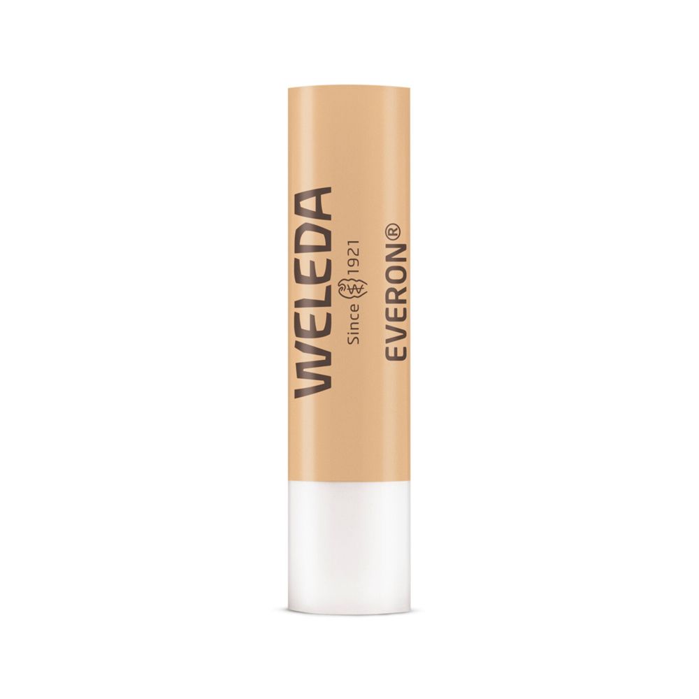 Stick per labbra Everon®. Stick beige con estremità bianca. Logo e scritta Weleda.