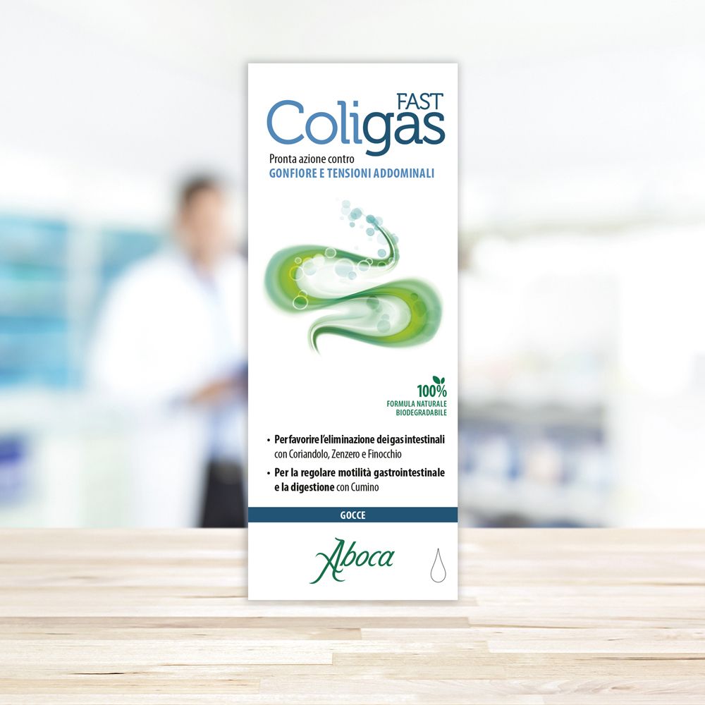 Confezione di Coligas Fast Gocce. Scritta blu e verde. Logo Aboca. Formula naturale al 100%.