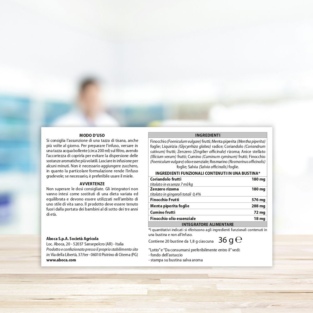 Retro della confezione Aboca Coligas Fast Tisana. Contiene informazioni su ingredienti, uso e avvertenze. Sfondo sfocato.