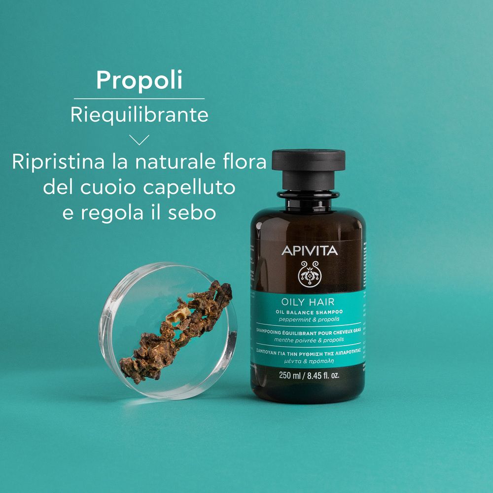 Flacone e Propoli. Testo: Propoli Riequilibrante, Ripristina la flora naturale del cuoio capelluto e regola il sebo.
