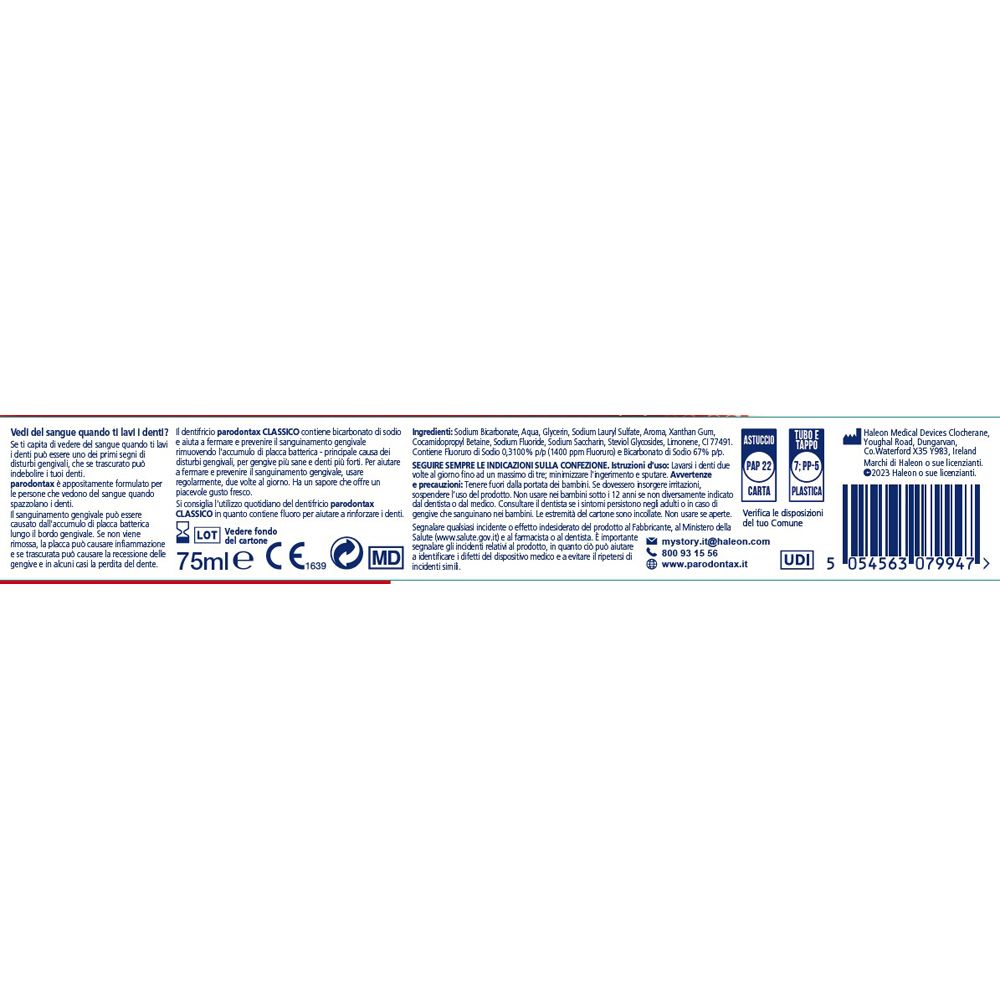 Retro della scatola del dentifricio. Testo in più lingue. Ingredienti, informazioni, loghi.