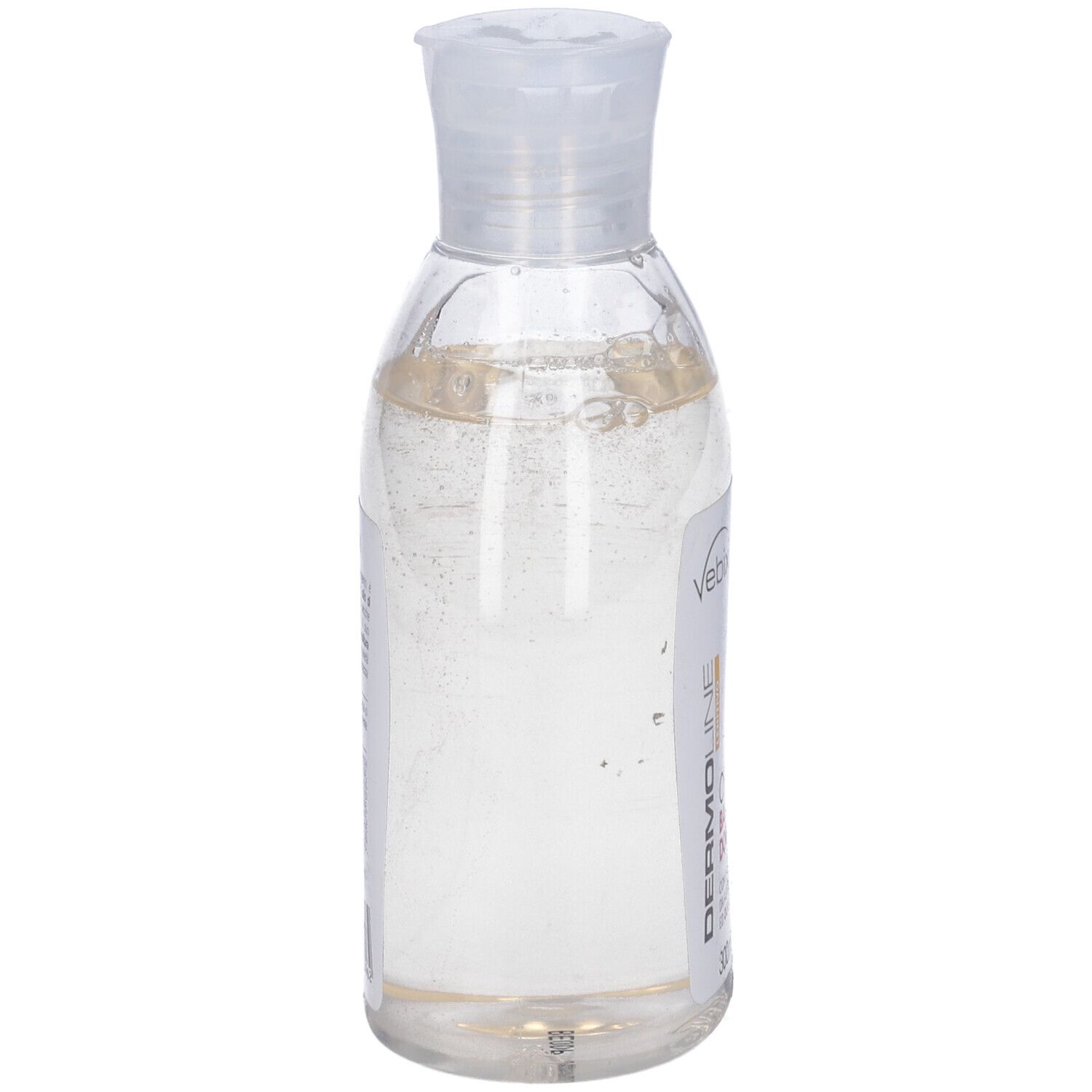Flacone trasparente con liquido giallastro. Tappo trasparente. Etichetta parzialmente visibile.
