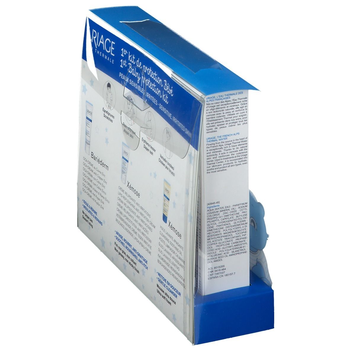 Kit protezione bebè. Retro con informazioni e illustrazioni. Crema e olio detergente. Testo in francese.