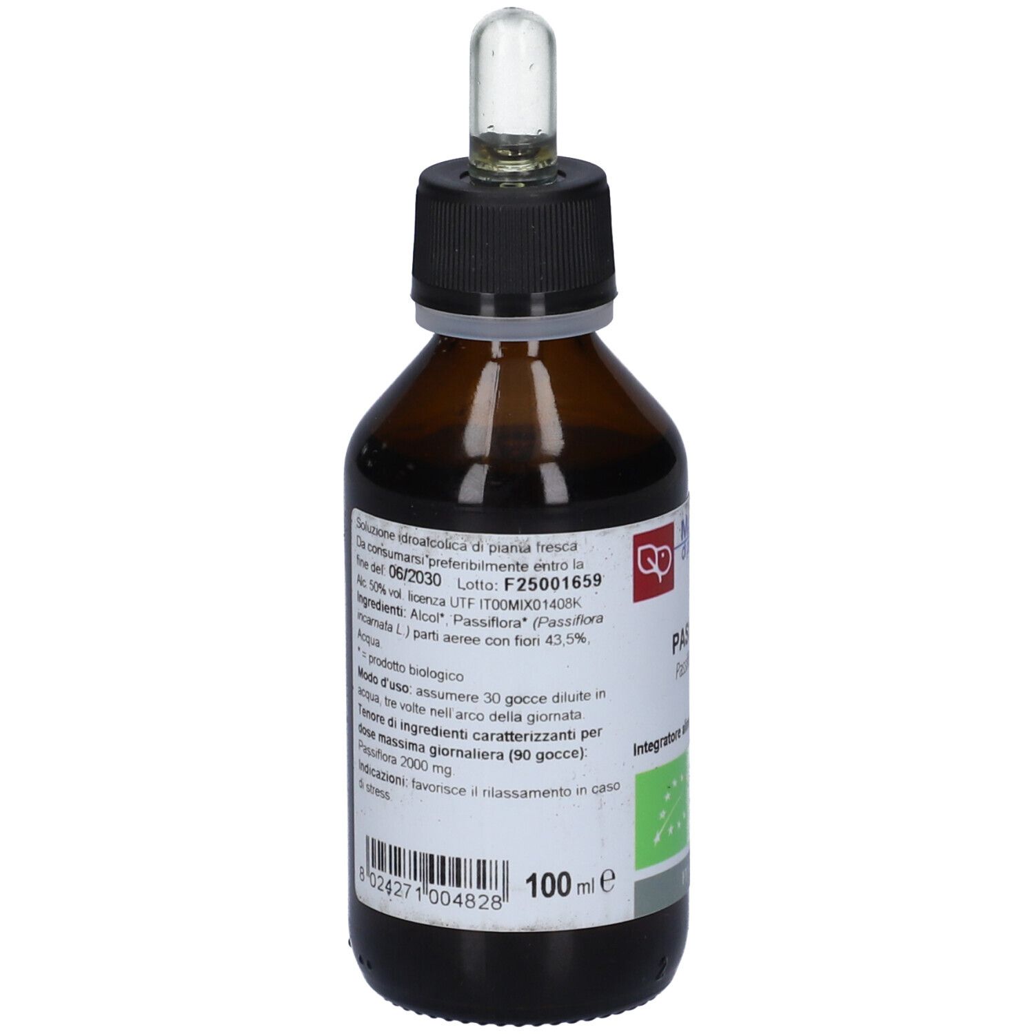 Flacone di vetro marrone con tappo nero e pipetta. Etichetta con informazioni sul prodotto e marchio bio.