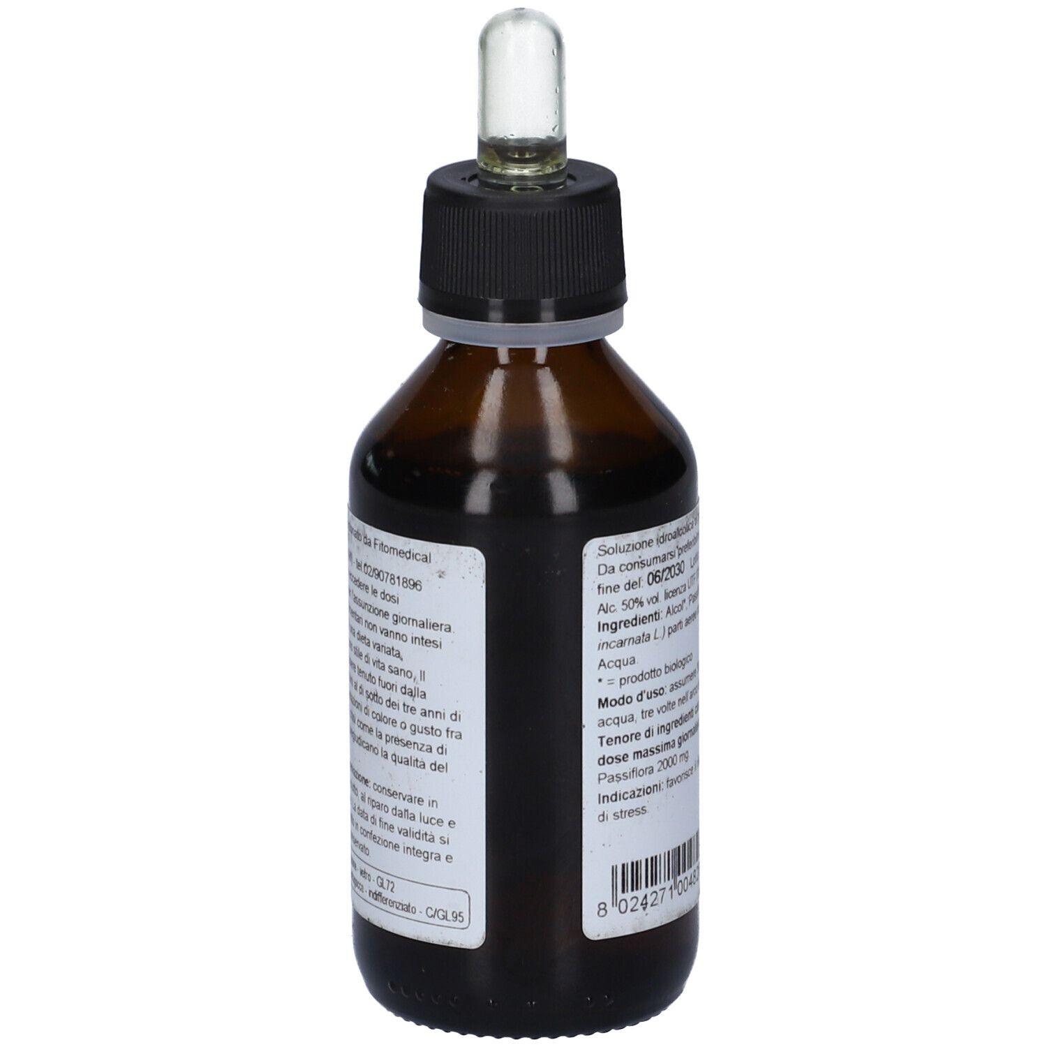 Flacone di vetro marrone con tappo nero e pipetta. Etichetta con informazioni sul prodotto.