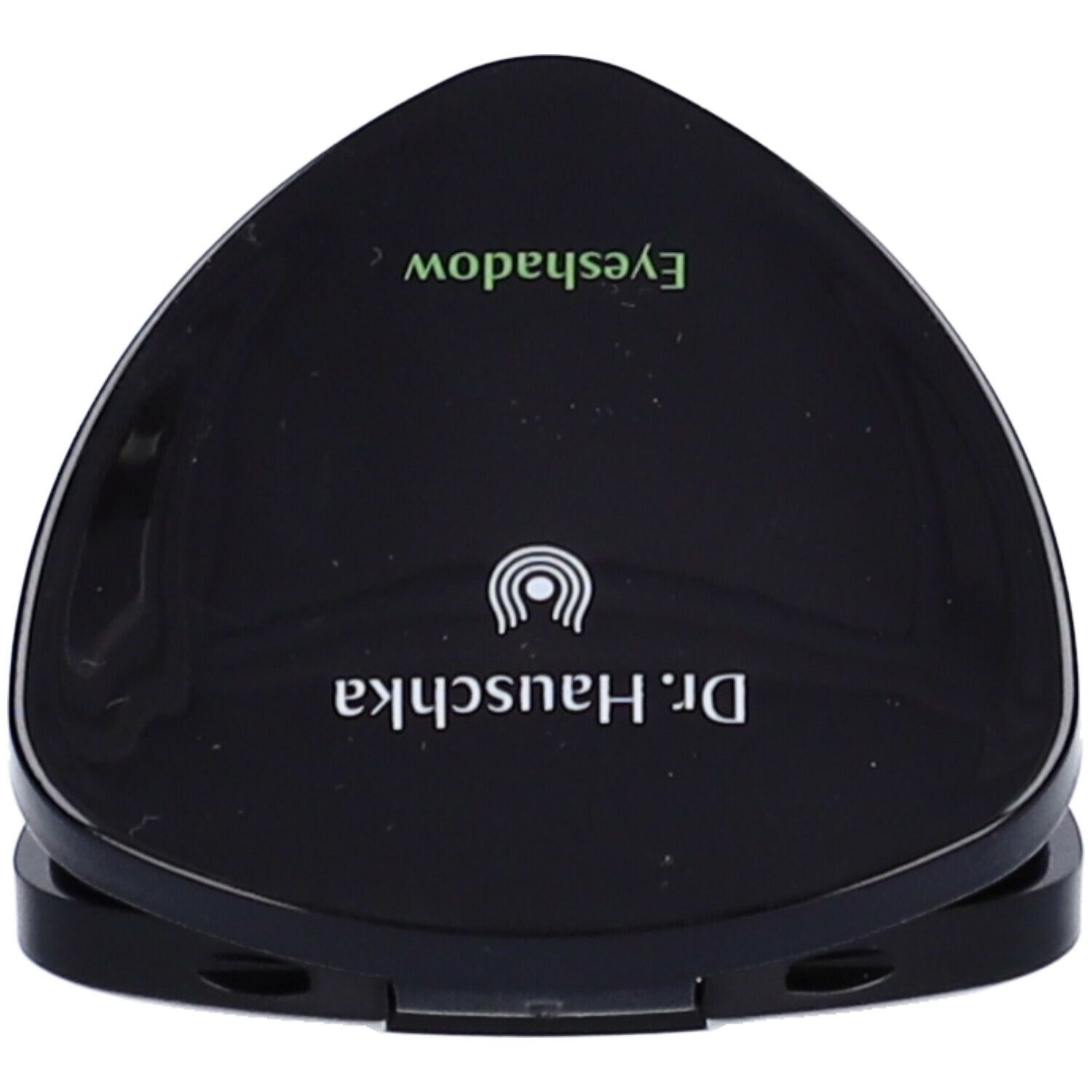 Contenitore nero di ombretto chiuso. Marchio Dr. Hauschka. Scritta Eyeshadow.