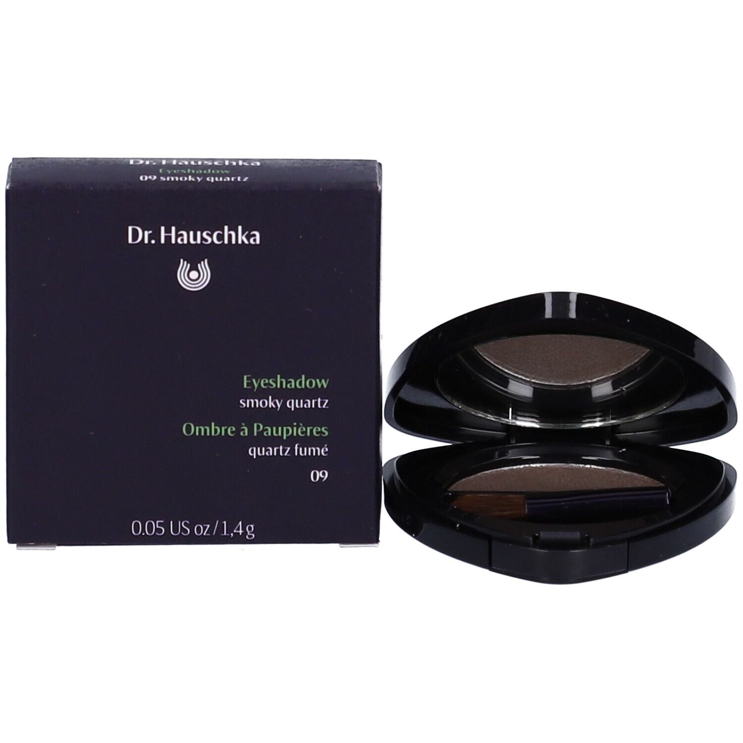 Contenitore nero di ombretto e confezione. Contiene ombretto, pennello e specchio. Marchio Dr. Hauschka.