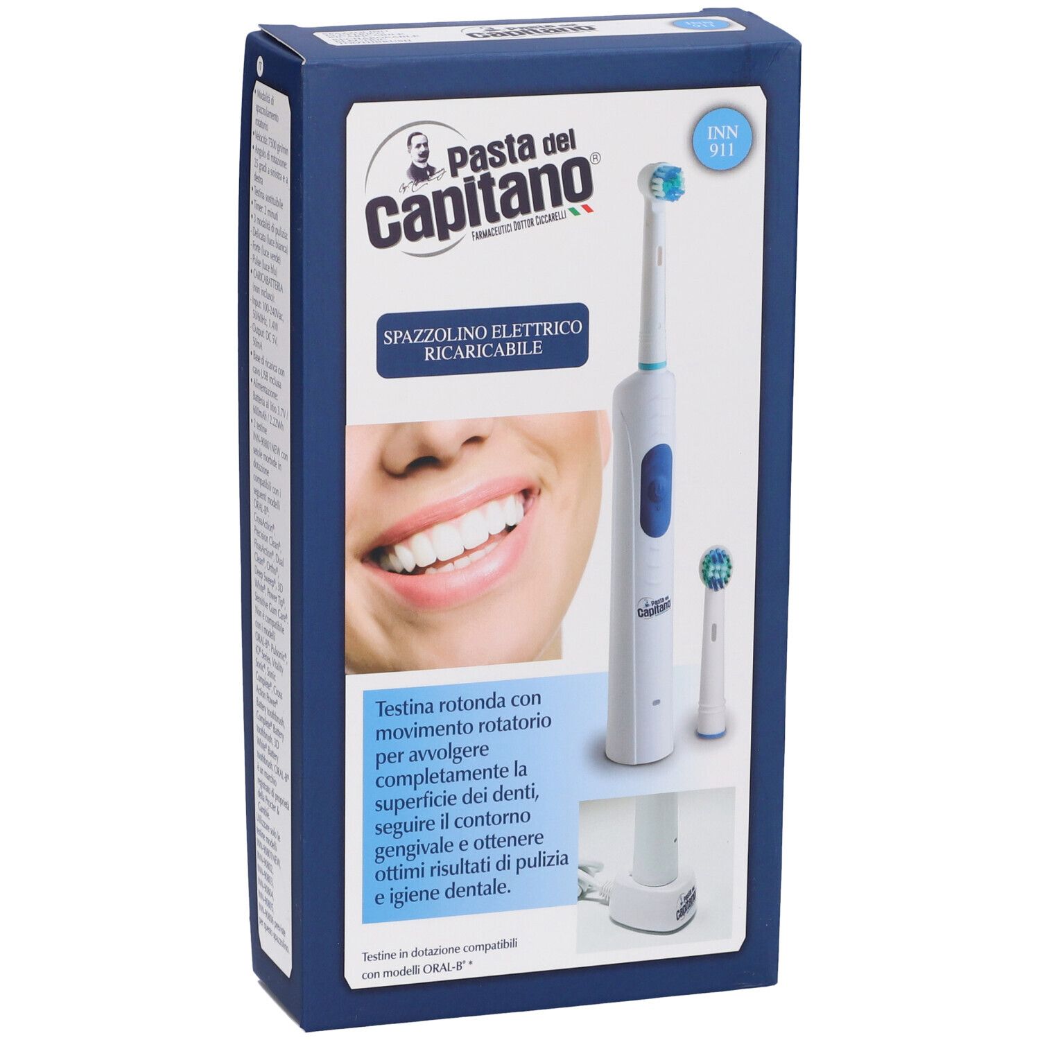 Spazzolino elettrico in confezione. Spazzolino bianco e blu con testina di ricambio e base di ricarica. Marchio: Pasta del Capitano.