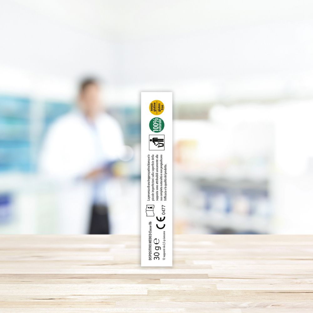Vista laterale della confezione con testo. Testo: 30 g. Loghi: 100% naturale, marchio CE, simbolo di riciclaggio.