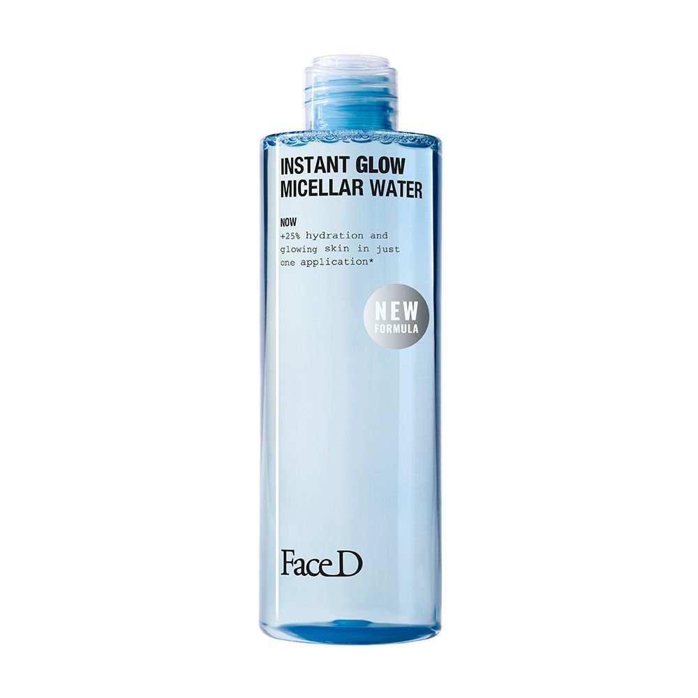 Flacone trasparente con liquido blu. Scritta: INSTANT GLOW MICELLAR WATER, Face D. Nuovo prodotto.