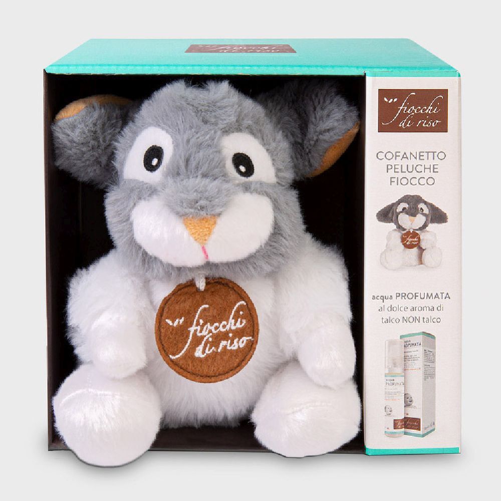 Confezione regalo con peluche coniglio e confezione prodotto. Scritta: Fiocchi di Riso. Nome prodotto: Cofanetto Peluche Fiocco.