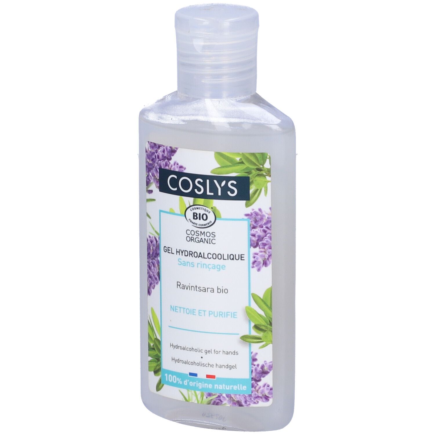 Flacone trasparente con etichetta bianca. Scritta: Coslys, Gel Hydroalcoolique, Sans rinçage. Illustrazione di fiori viola.