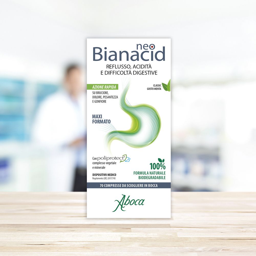 Scatola bianca "neo Bianacid". Testo: Reflusso, acidità, difficoltà digestive. Design verde e bianco. Marca: Aboca.