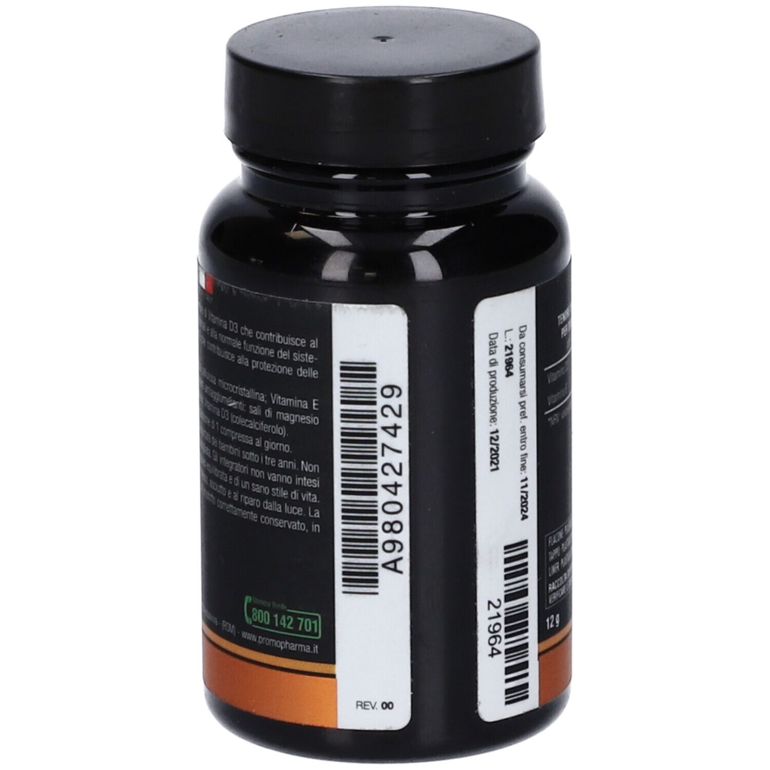 Vista posteriore del flacone nero. Etichetta con codice a barre e numero di lotto. Striscia arancione in basso.