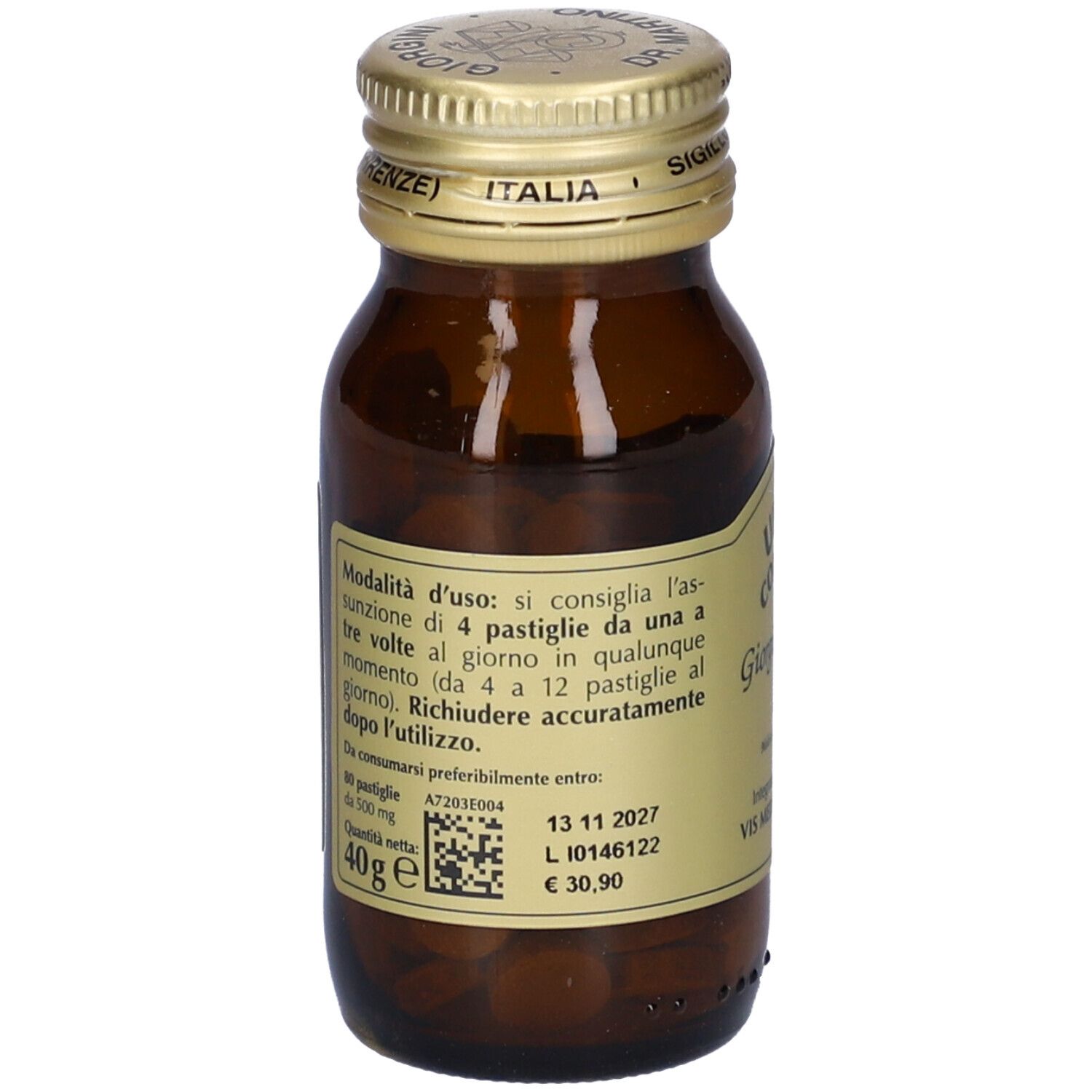 Flacone di vetro marrone con tappo dorato. Etichetta con testo. Contiene compresse. 80 compresse. 40g.