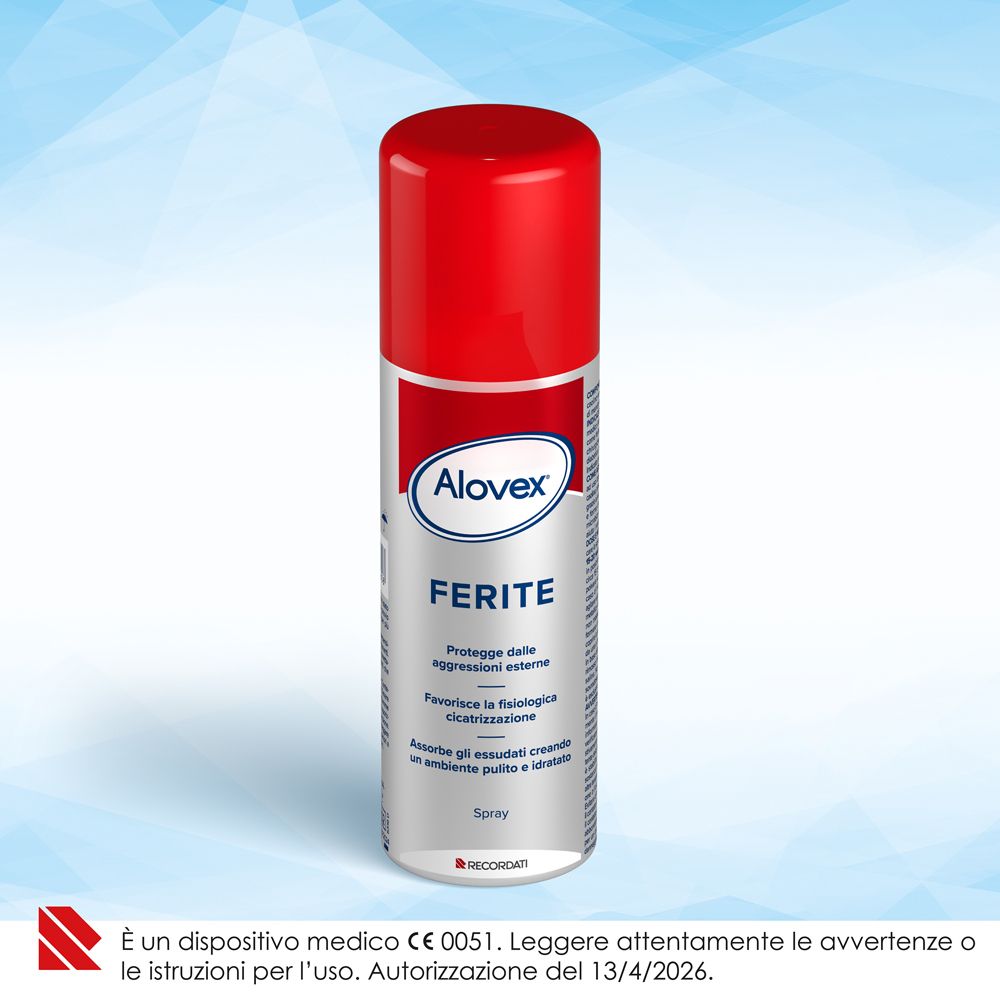 Alovex Ferite Spray: bomboletta argento con tappo rosso, etichette con informazioni sul prodotto.
