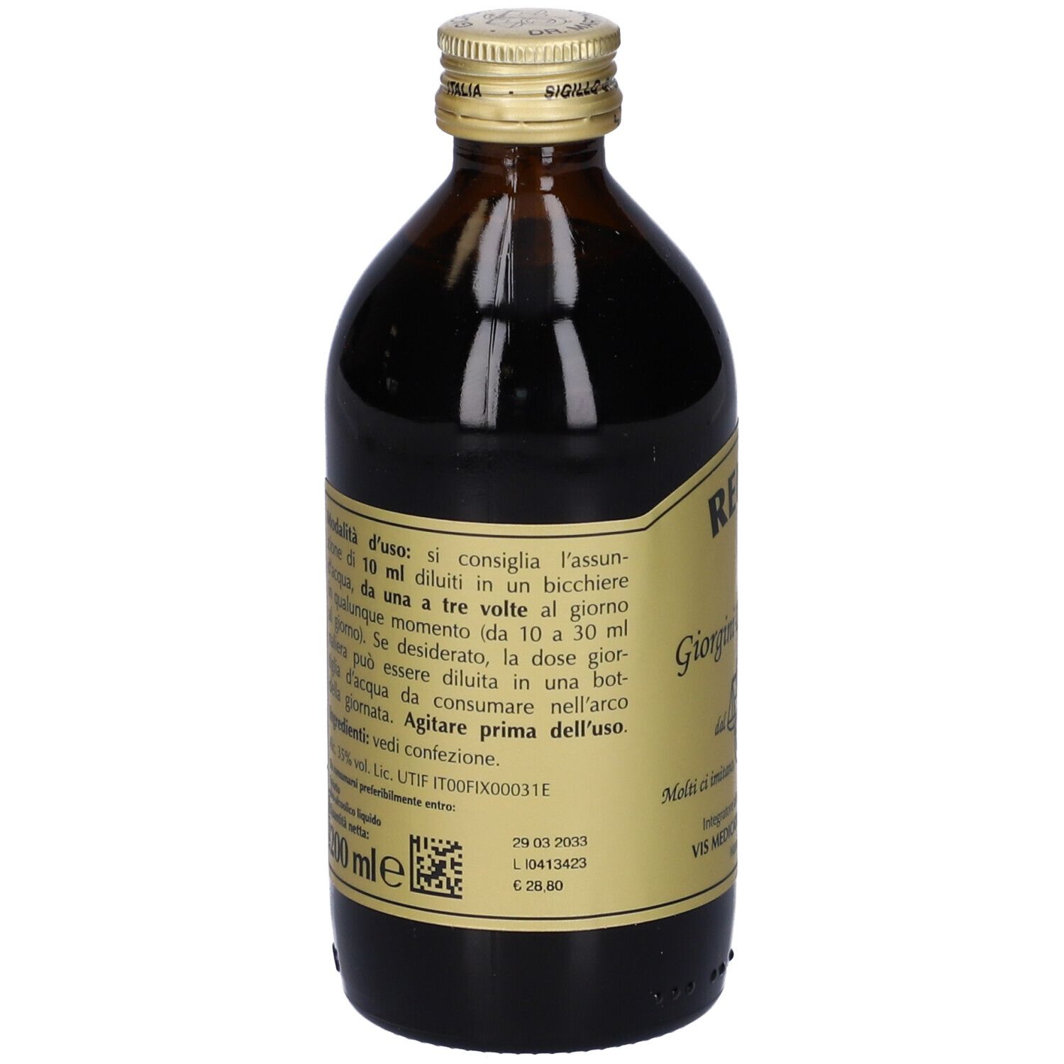 Retro della bottiglia Reuvis. Etichetta con ingredienti e istruzioni per l'uso. Bottiglia di vetro marrone con tappo dorato.