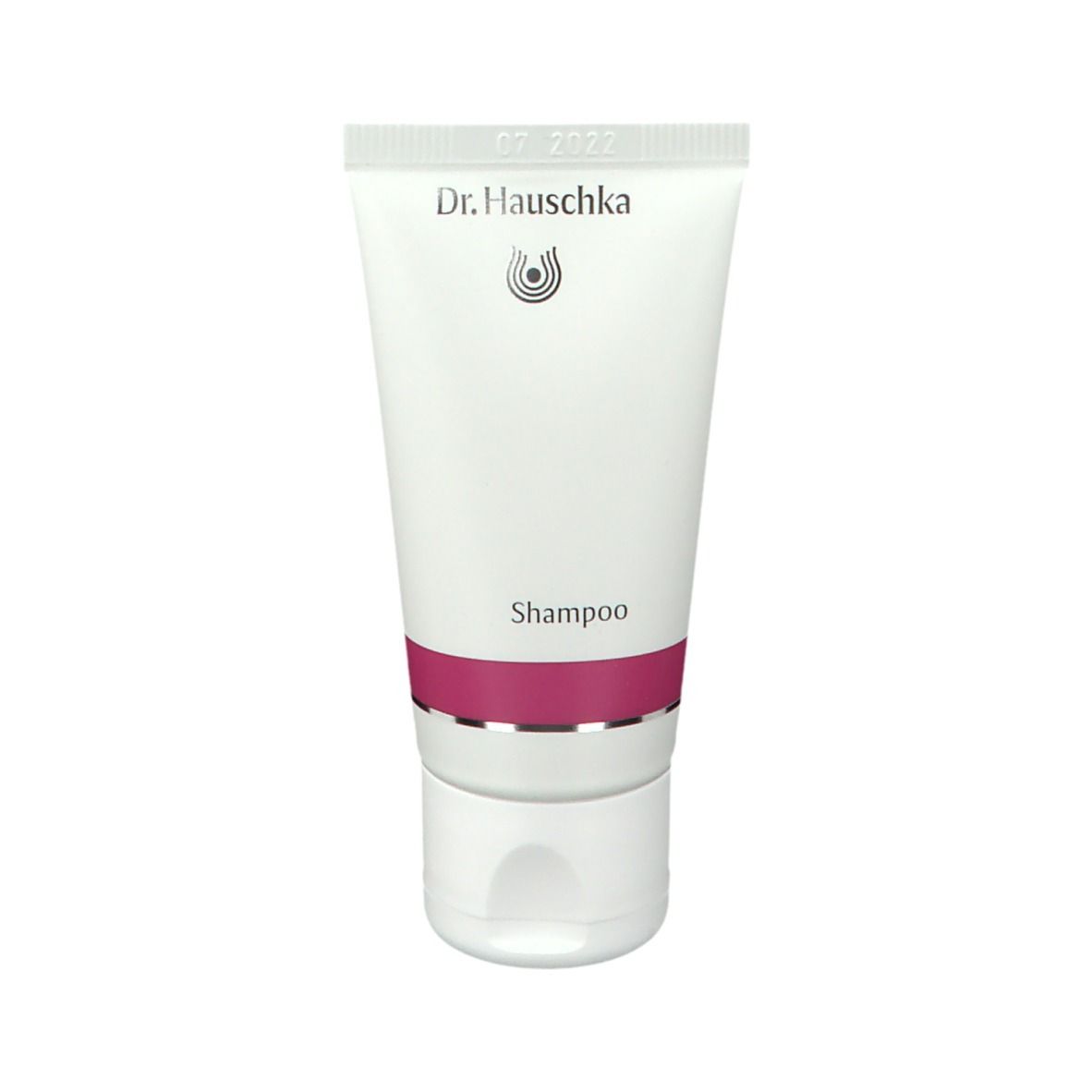 Tubo bianco con fascia viola. Scritta: Dr. Hauschka, Shampoo. Data: 07 2022. Tappo in basso.