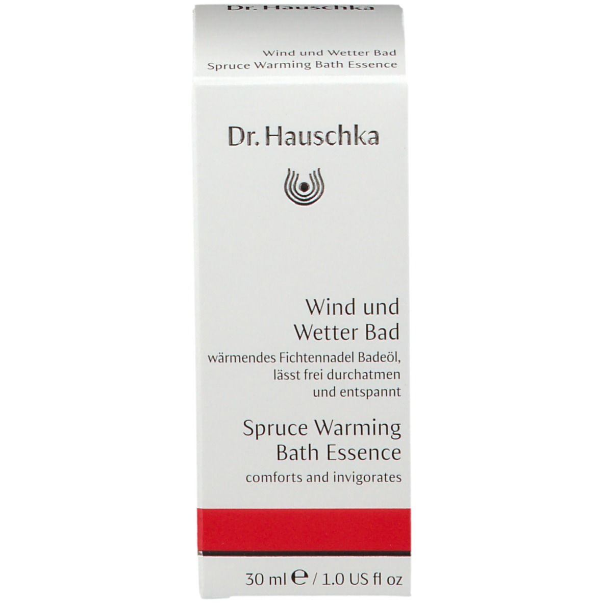 Confezione bianca con logo Dr. Hauschka. Testo: Wind und Wetter Bad, Spruce Warming Bath Essence, 30 ml / 1.0 US fl oz. Striscia rossa.