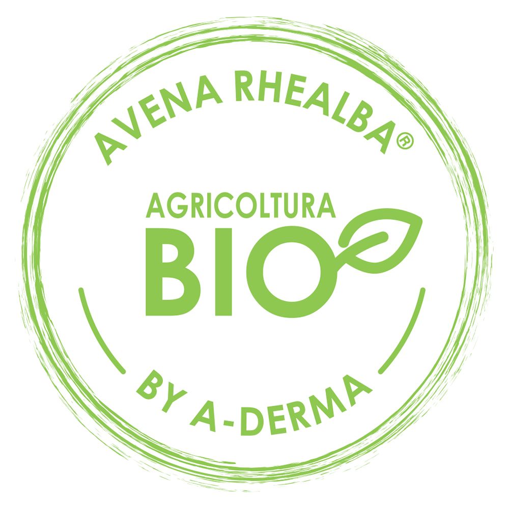 Logo rotondo verde con testo: AVENA RHEALBA, AGRICOLTURA BIO, BY A-DERMA.