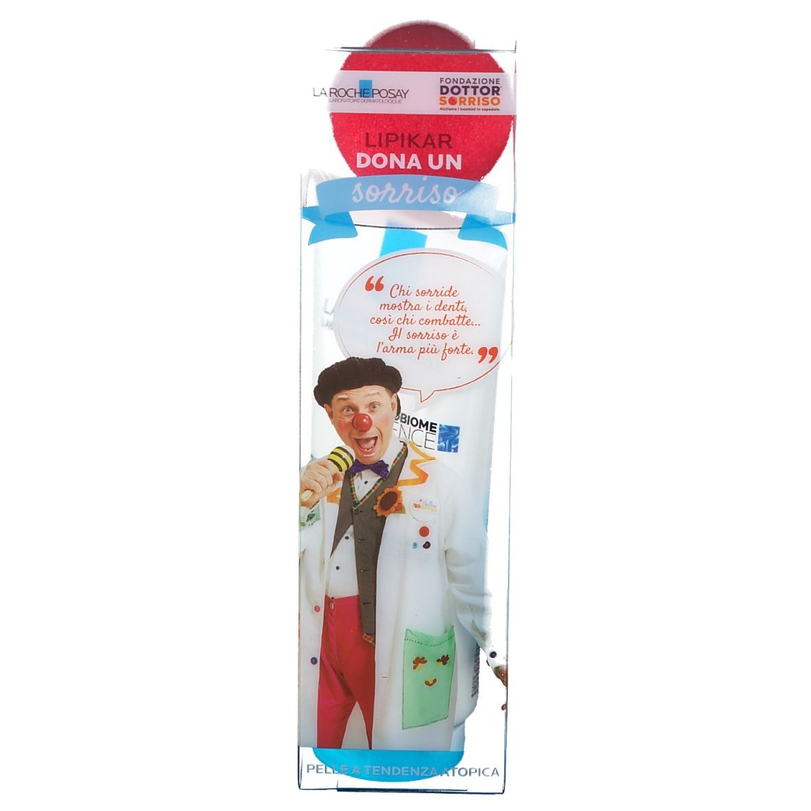 La Roche-Posay Lipikar Balsamo in confezione. Illustrazione di clown. Testo: Lipikar Dona un Sorriso. Per pelli sensibili.