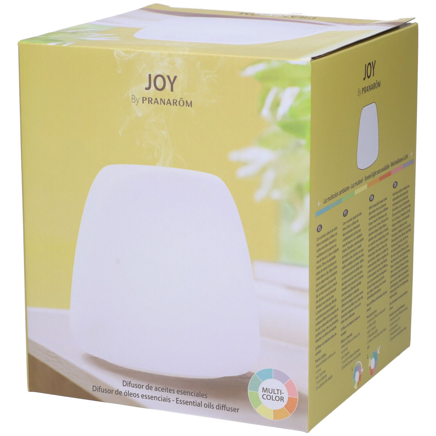 Scatola con diffusore bianco. Scritta: JOY by Pranarôm. Testo multilingue. Cerchio multicolore.