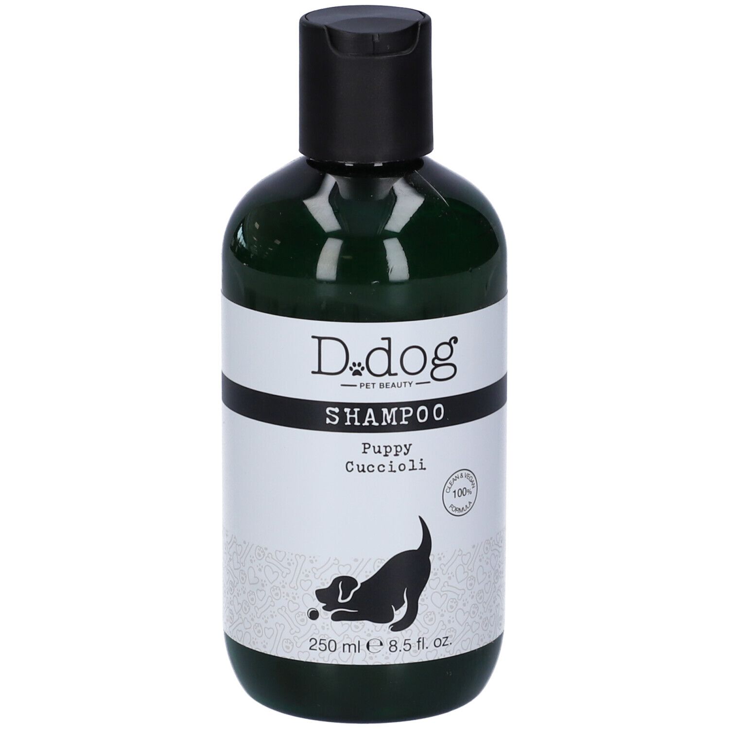 Flacone verde con tappo nero. Etichetta "D.dog" Shampoo "Puppy Cuccioli". 250 ml.