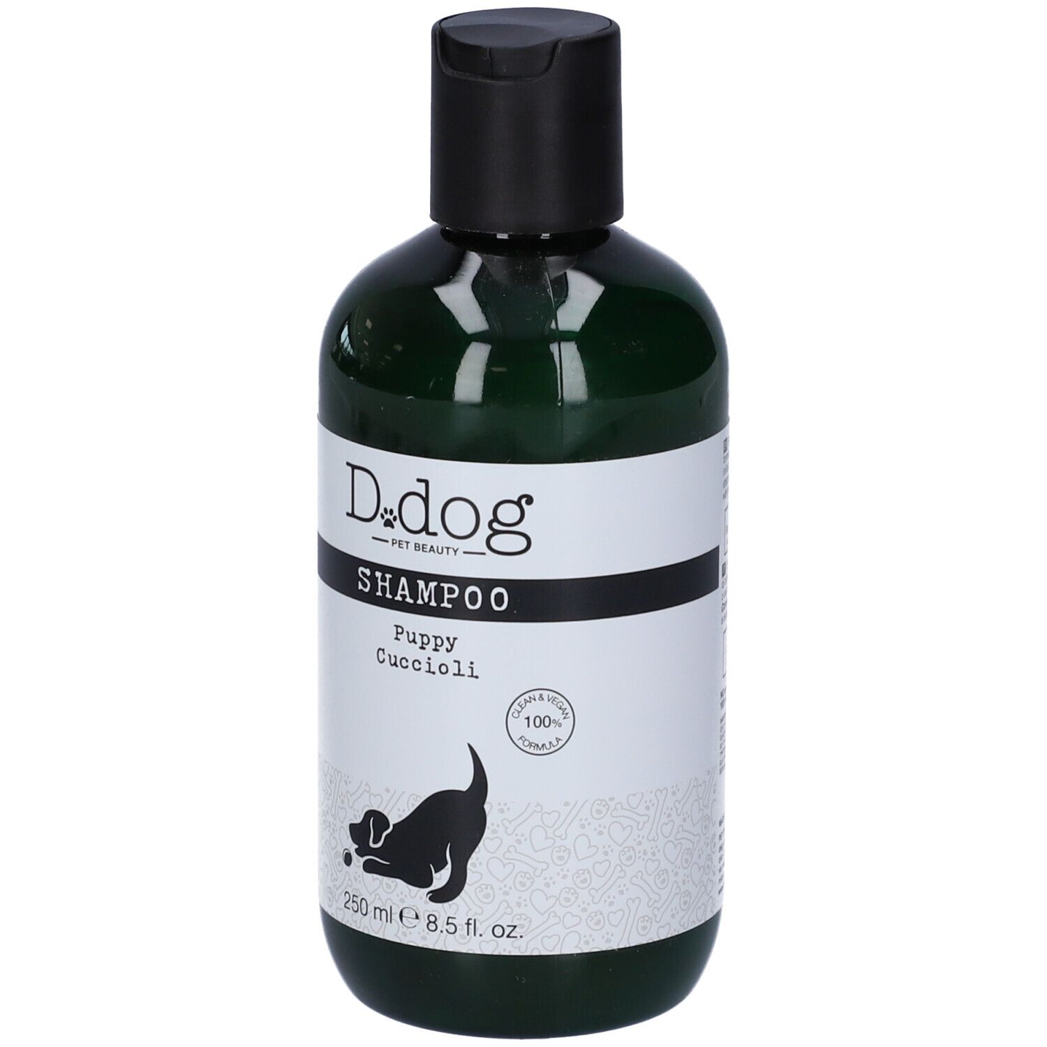 Flacone verde con tappo nero. Etichetta "D.dog" Shampoo "Puppy Cuccioli". 250 ml.