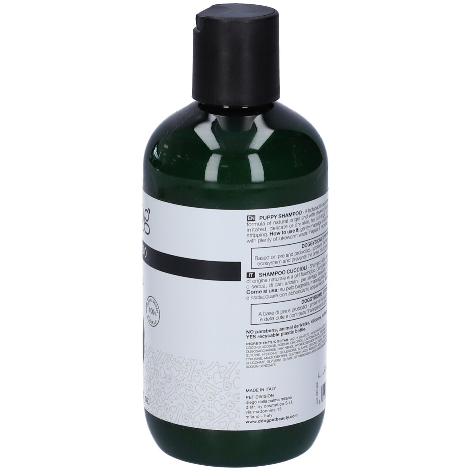 Flacone verde, vista posteriore. Testo sull'etichetta. Ingredienti e istruzioni. "DOGGYBIOME SYSTEM".