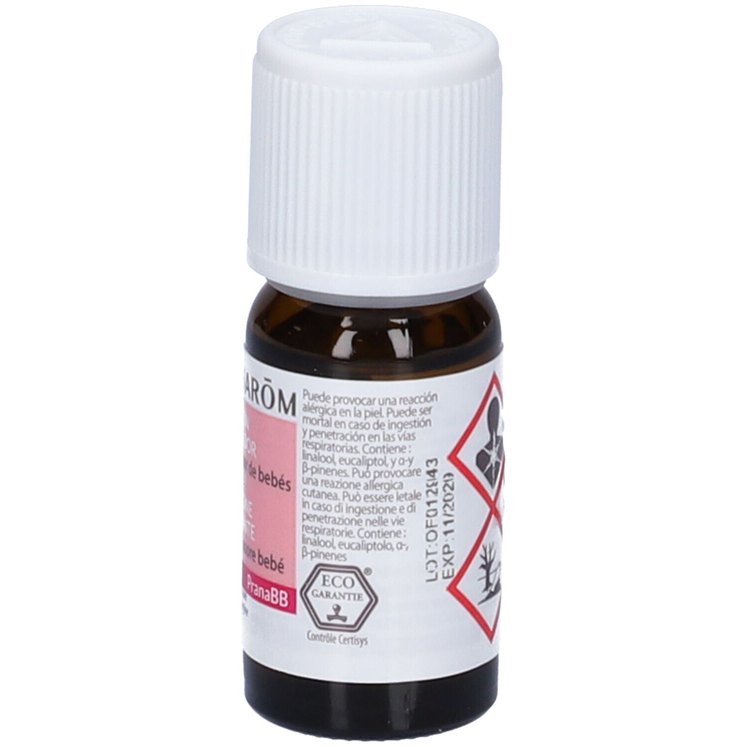 Flacone di vetro marrone con tappo bianco. Etichetta con informazioni e simboli di pericolo. "10 ml" e "Pranarom".