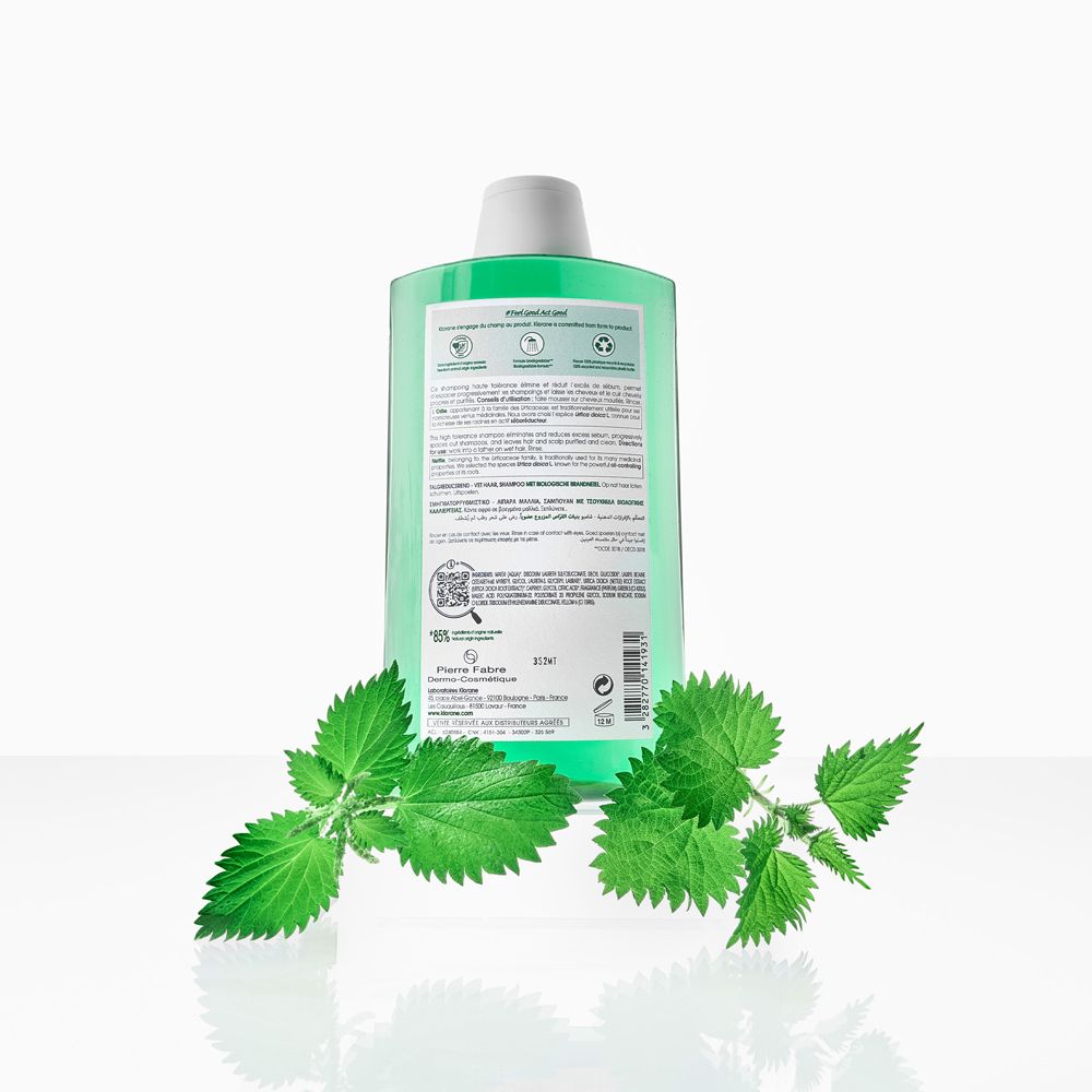 Retro flacone shampoo KLORANE. Testo, QR code e certificazioni. Foglie di ortica.