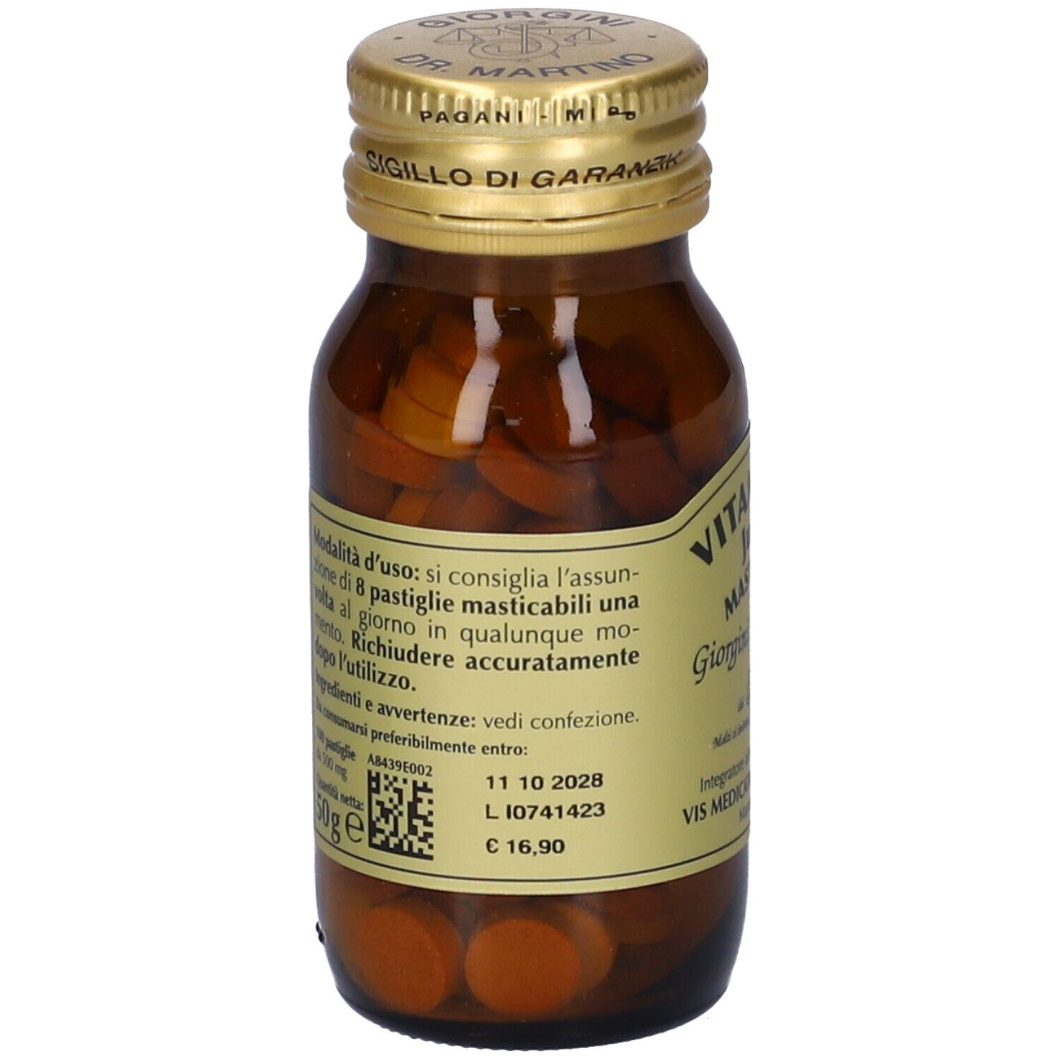 Retro del flacone di vetro marrone con tappo dorato. Contiene informazioni sugli ingredienti e la data di scadenza.