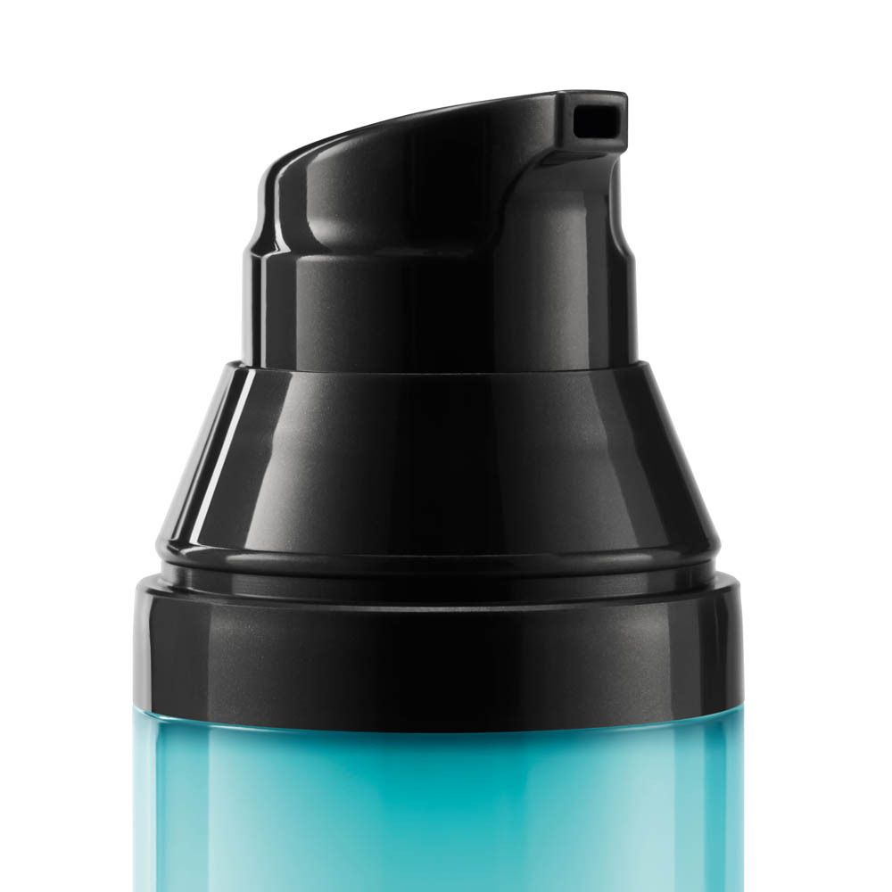 Primo piano dell'erogatore nero di un flacone. Plastica nera, lucida.