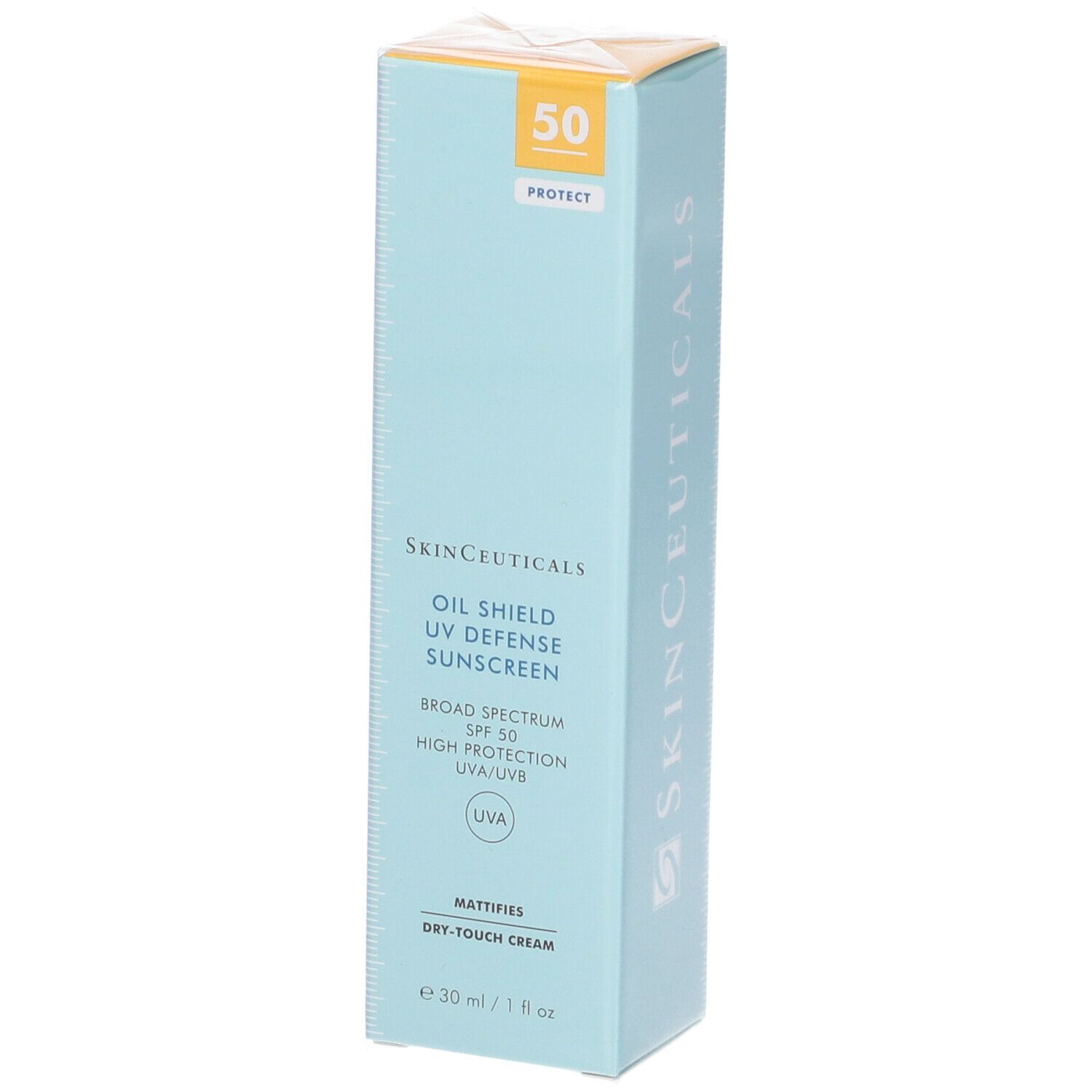 Confezione di cartone con protezione solare. Scritta: Oil Shield UV Defense Sunscreen, SPF 50. Sfondo azzurro.