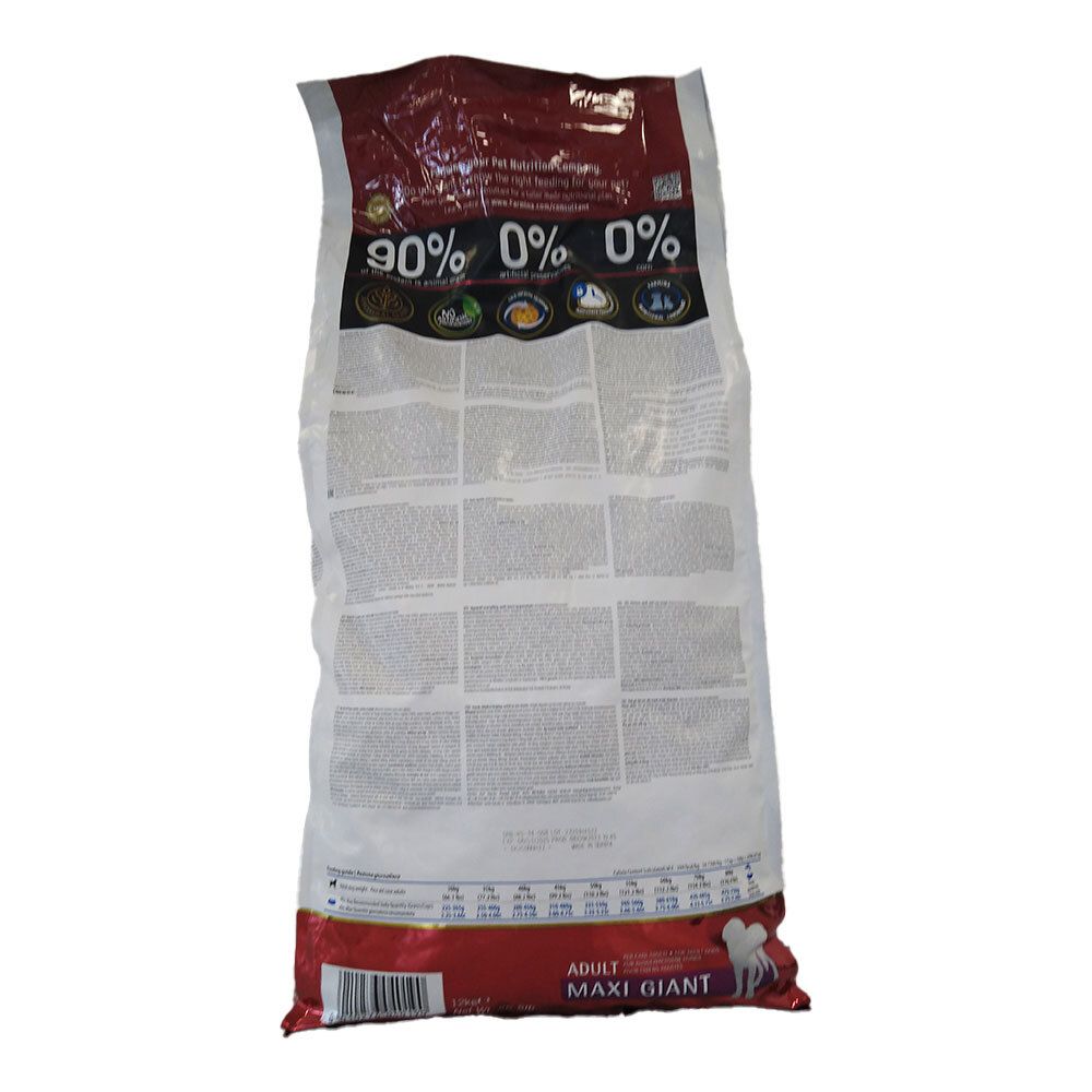 Retro del sacchetto di cibo per cani. Testo e loghi visibili. Sacchetto rosso e bianco.