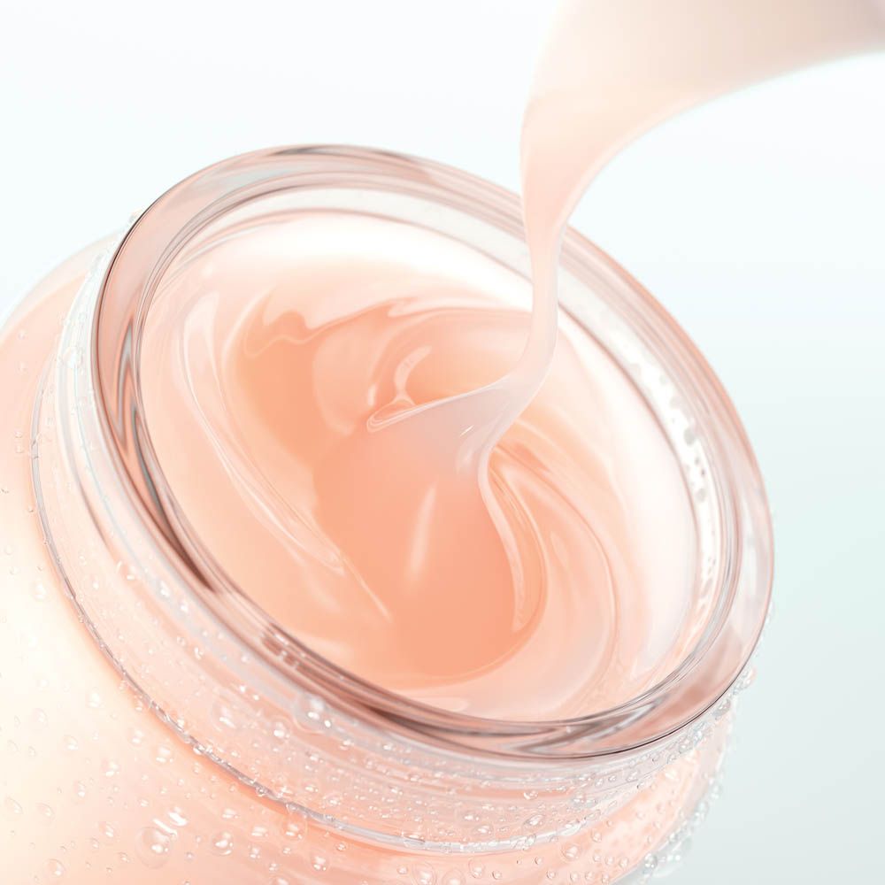 Primo piano della crema idratante Clinique in un barattolo di vetro.