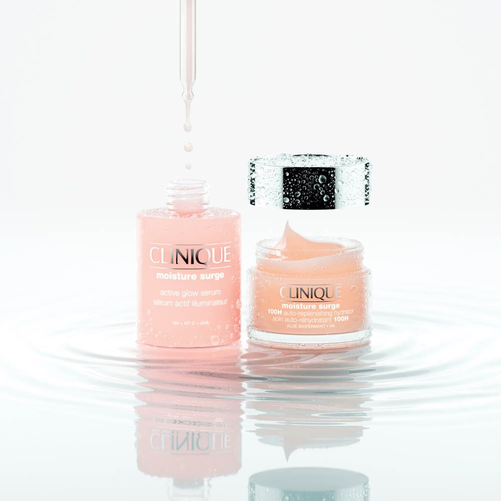 Siero Clinique Moisture Surge e crema idratante con contagocce e vasetto.