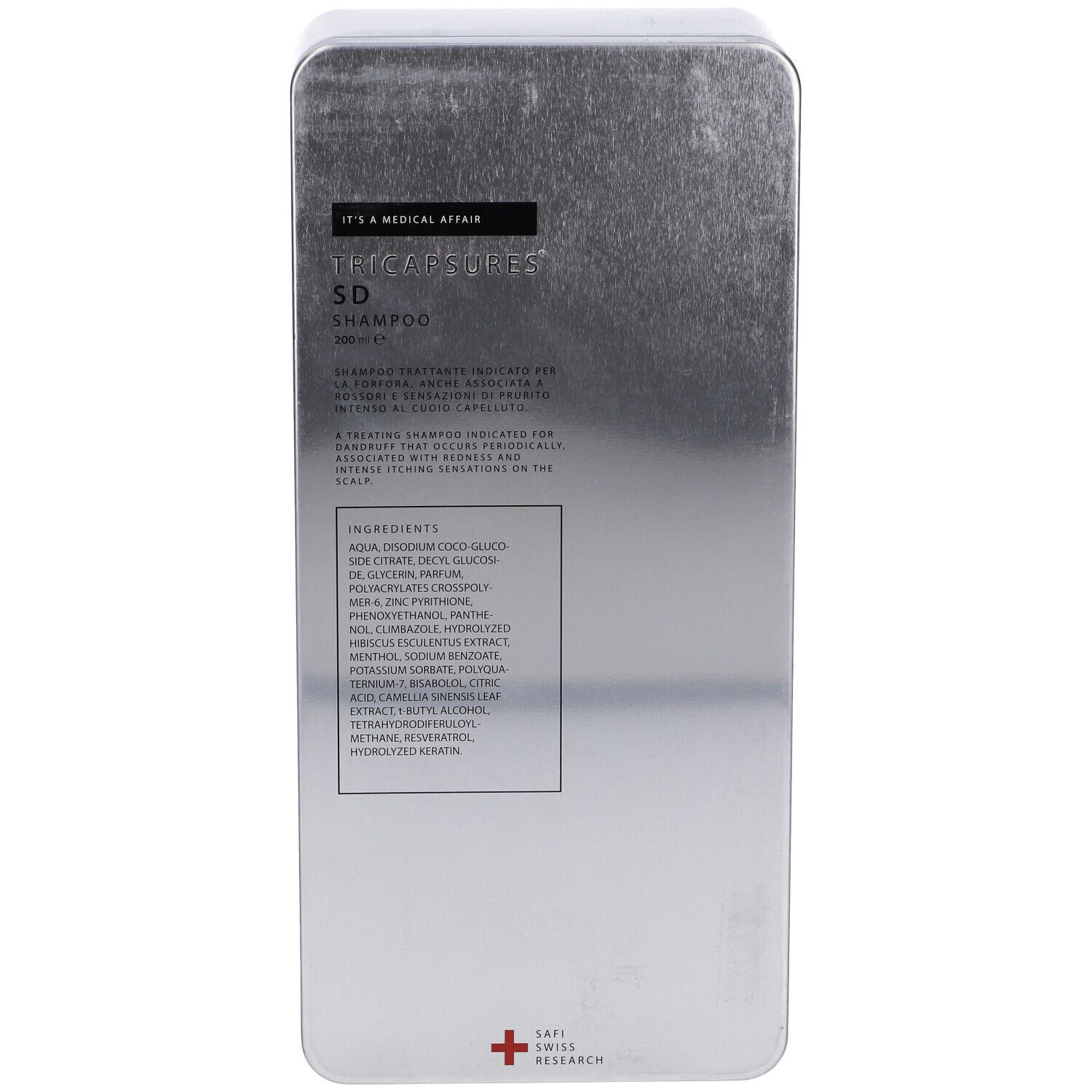 Scatola rettangolare argentata con testo. Scritto: Tricapsures SD Shampoo. In basso: Logo Swiss Research.
