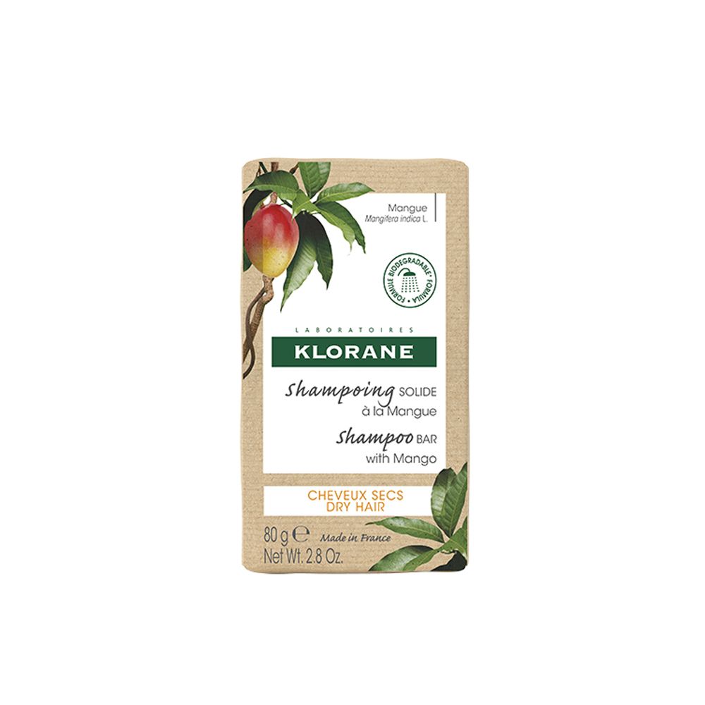 Confezione Klorane Shampoo Solido al Mango. Immagine di mango e foglie.