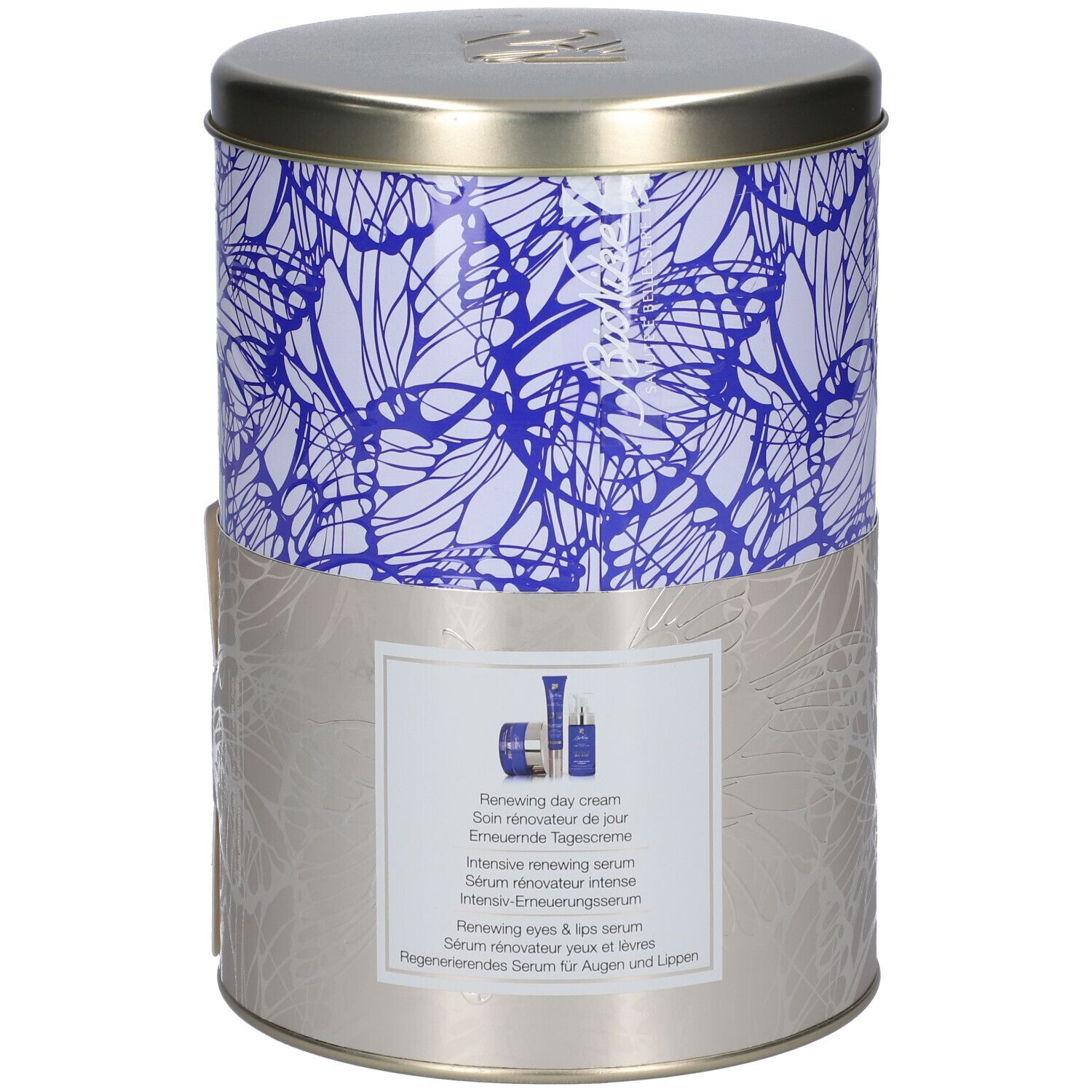 Barattolo con motivo blu e bianco. Contiene prodotti. Scritta: Renewing day cream, siero.