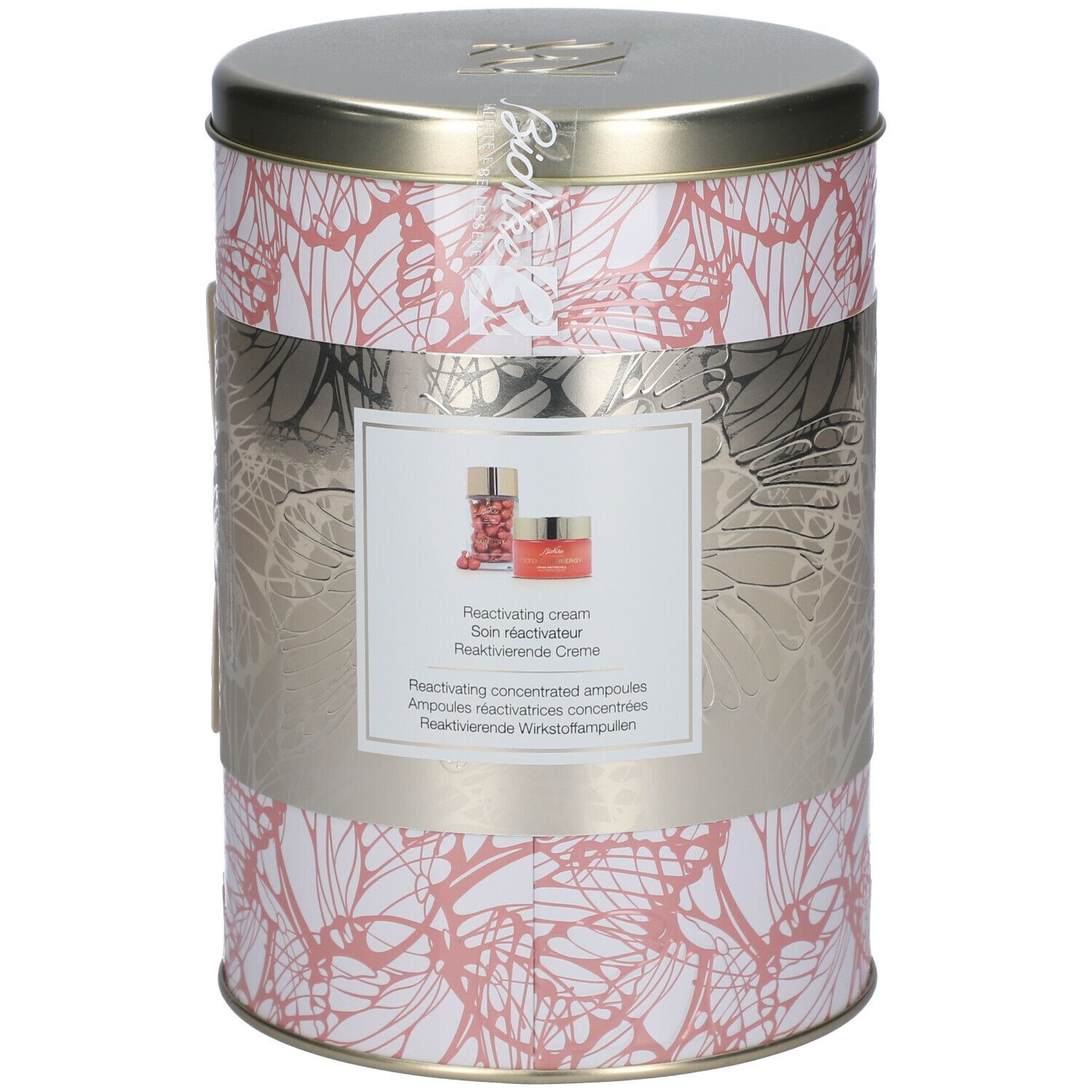 Barattolo cilindrico con motivo floreale e fascia argentata. La fascia riporta 'DEFENCE SKINERGY' e 'Crema riattivatrice'.