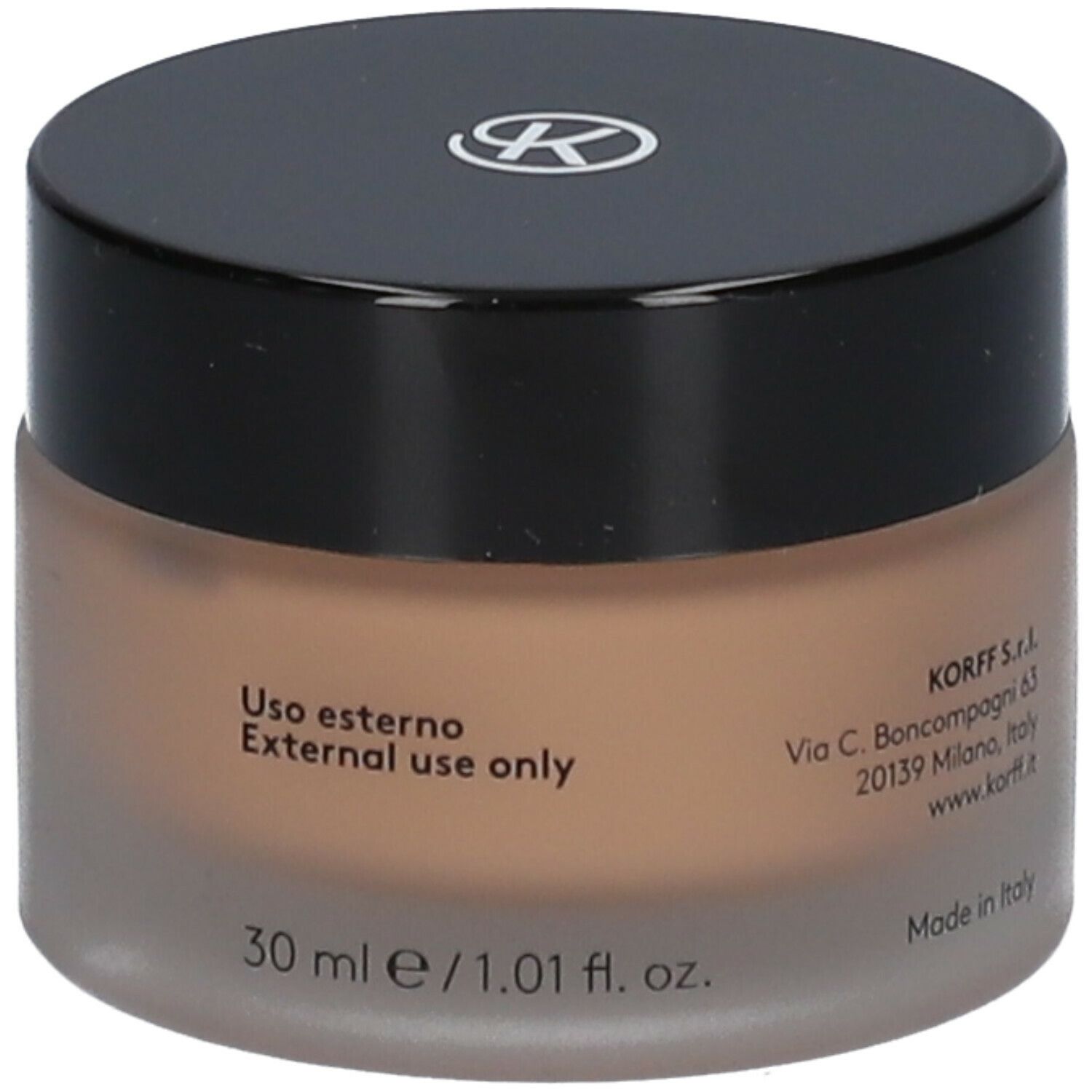 Fondotinta in crema beige in vasetto rotondo con coperchio nero. Scritta: Uso esterno. 30 ml.