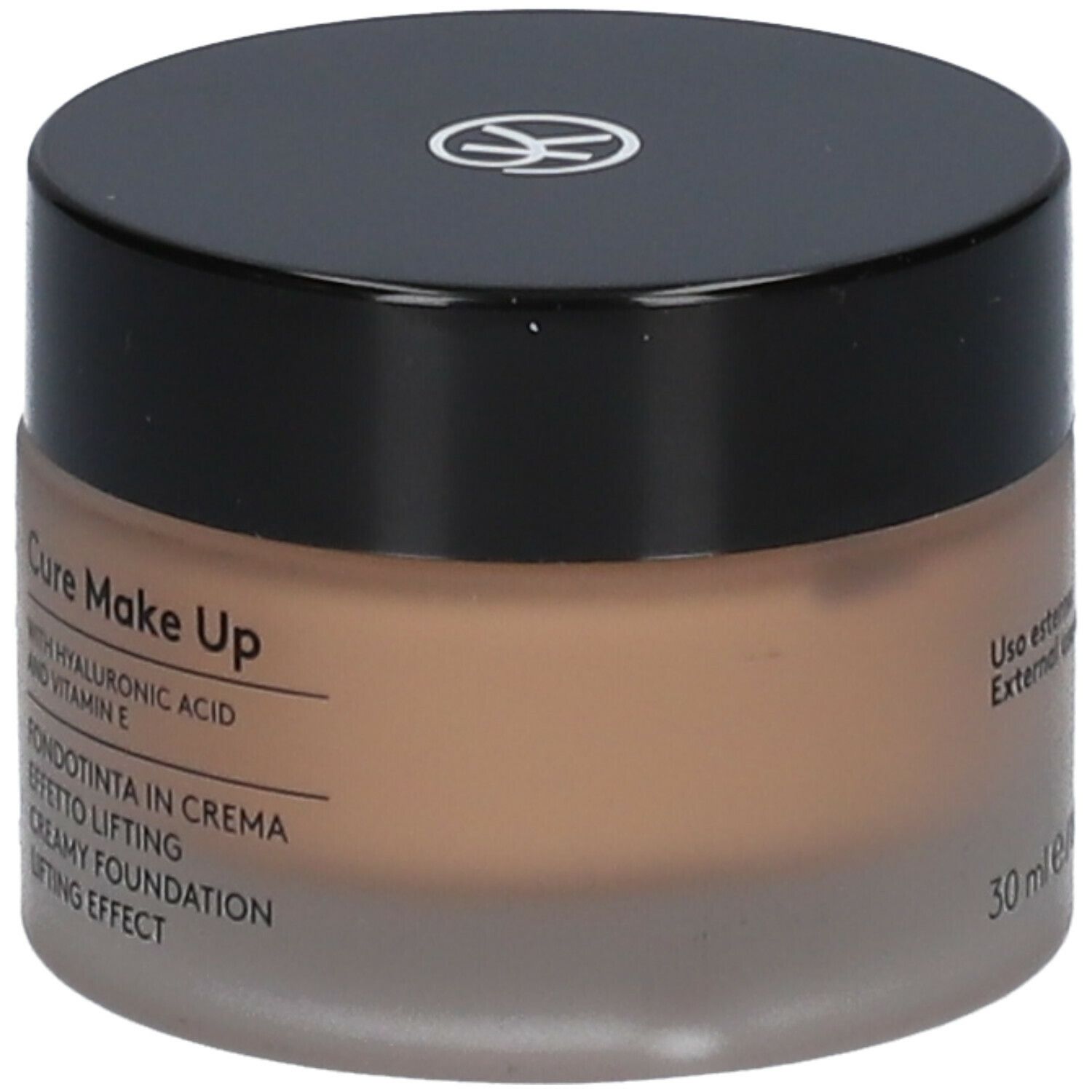 Fondotinta in crema beige in vasetto rotondo con coperchio nero. Scritta: Cure Make Up, 30 ml.